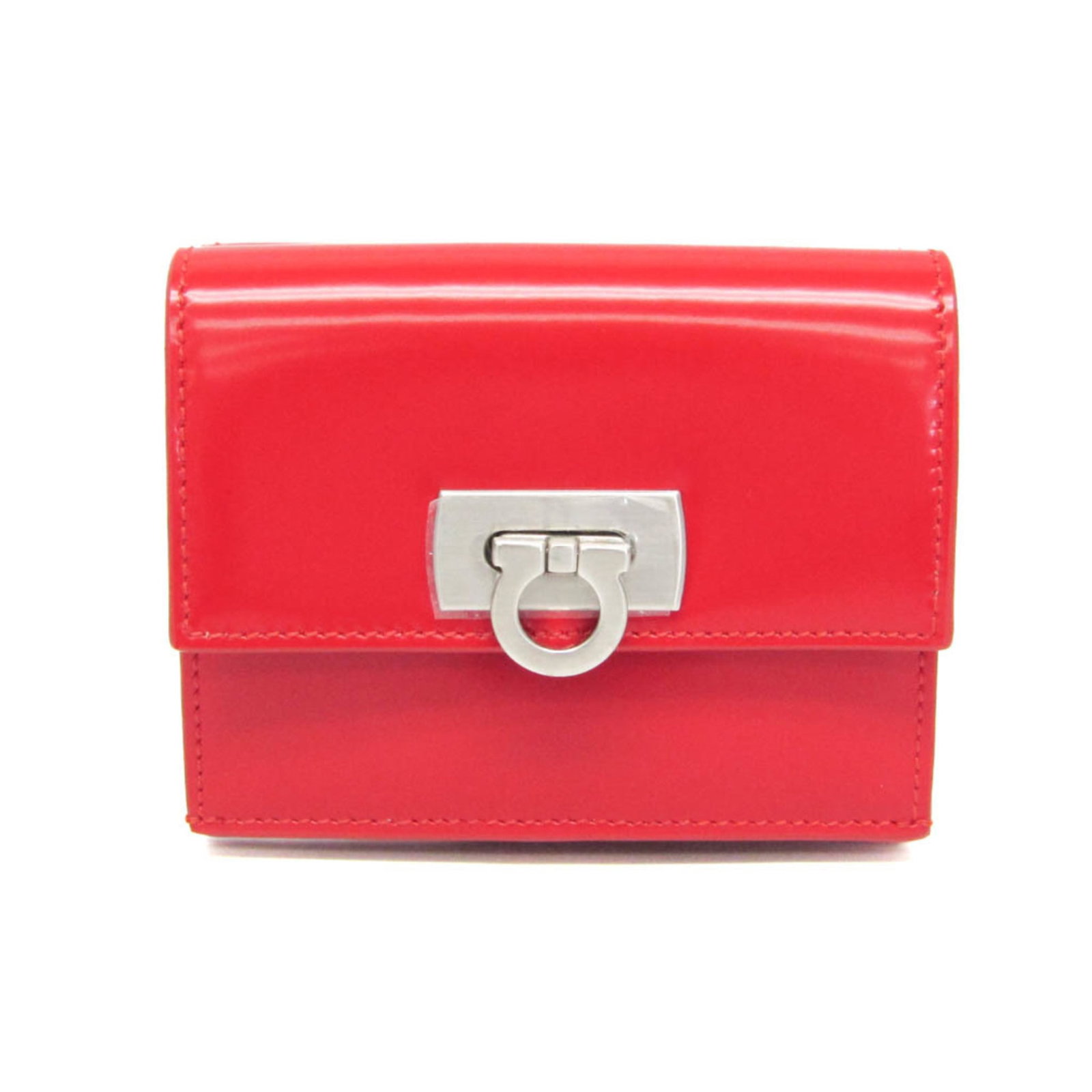 Salvatore Ferragamo Leather Wallet Bi-Fold: Salvatore Ferragamo Leather Wallet Bi-Fold The Salvatore Ferragamo Leather Wallet Bi-Fold is a striking FLAME RED bi-fold wallet featuring a sleek design and premium leather material. This stylish wal