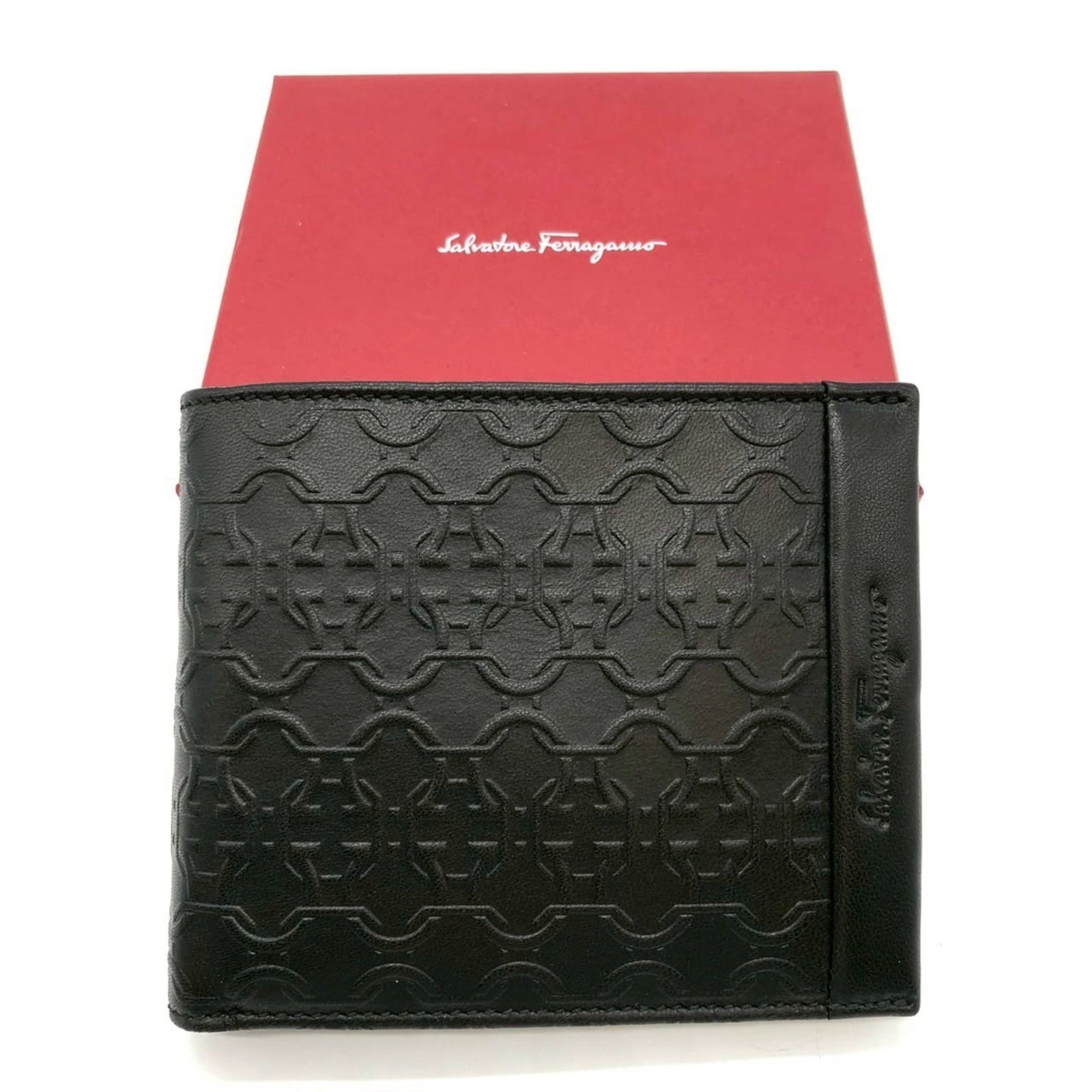 Salvatore Ferragamo Leather Wallet Bi-Fold: Salvatore Ferragamo Leather Wallet Bi-Fold The Salvatore Ferragamo Leather Wallet Bi-Fold is a stylish and sophisticated accessory, crafted from high-quality black leather. This bi-fold wallet