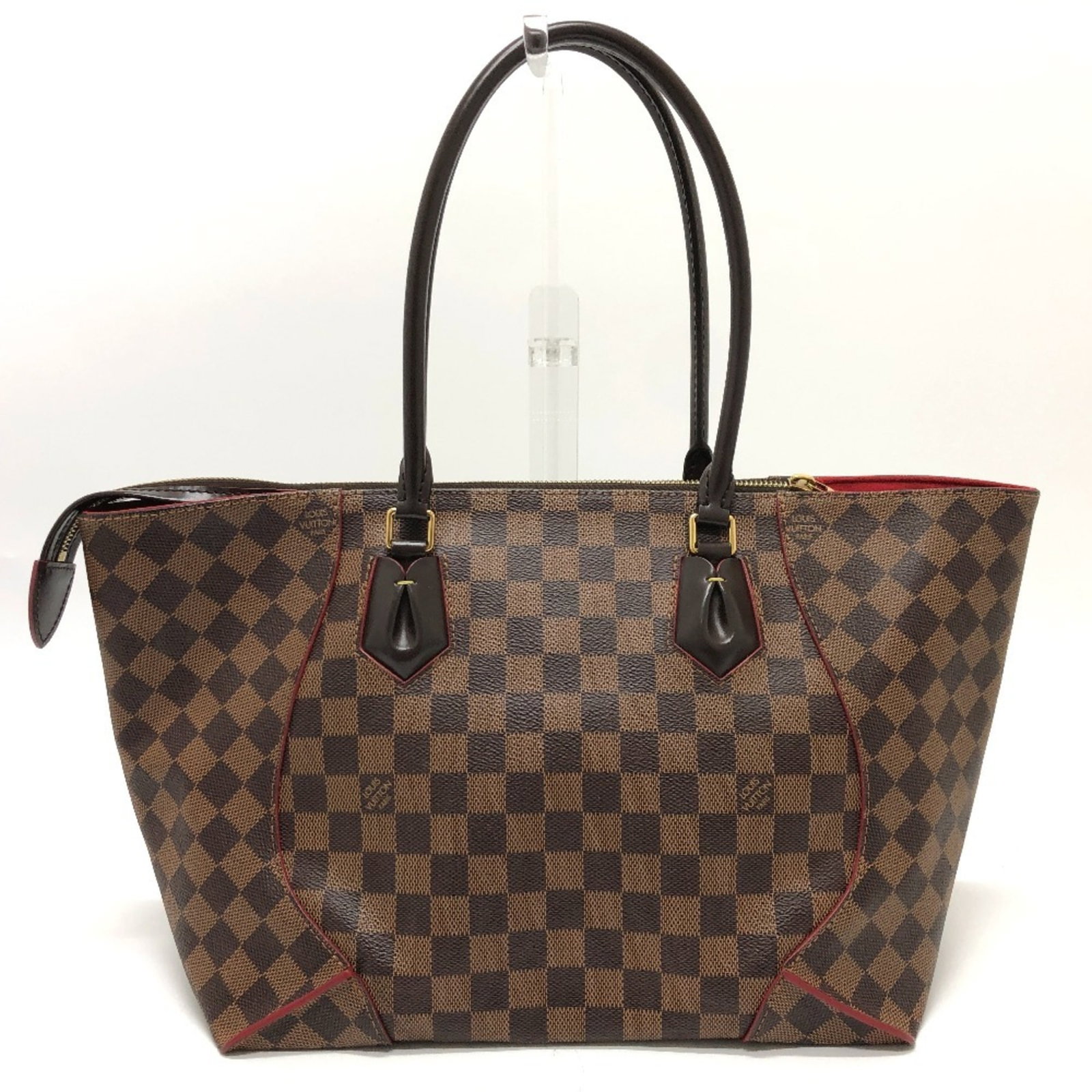 Shoulder Bag Damier Canvas By Louis Vuitton: Shoulder Bag Damier Canvas By Louis Vuitton Damier Canvas by Louis Vuitton shoulder bag features a classic design with a timeless brown Damier print, complemented by gold hardware and a sleek