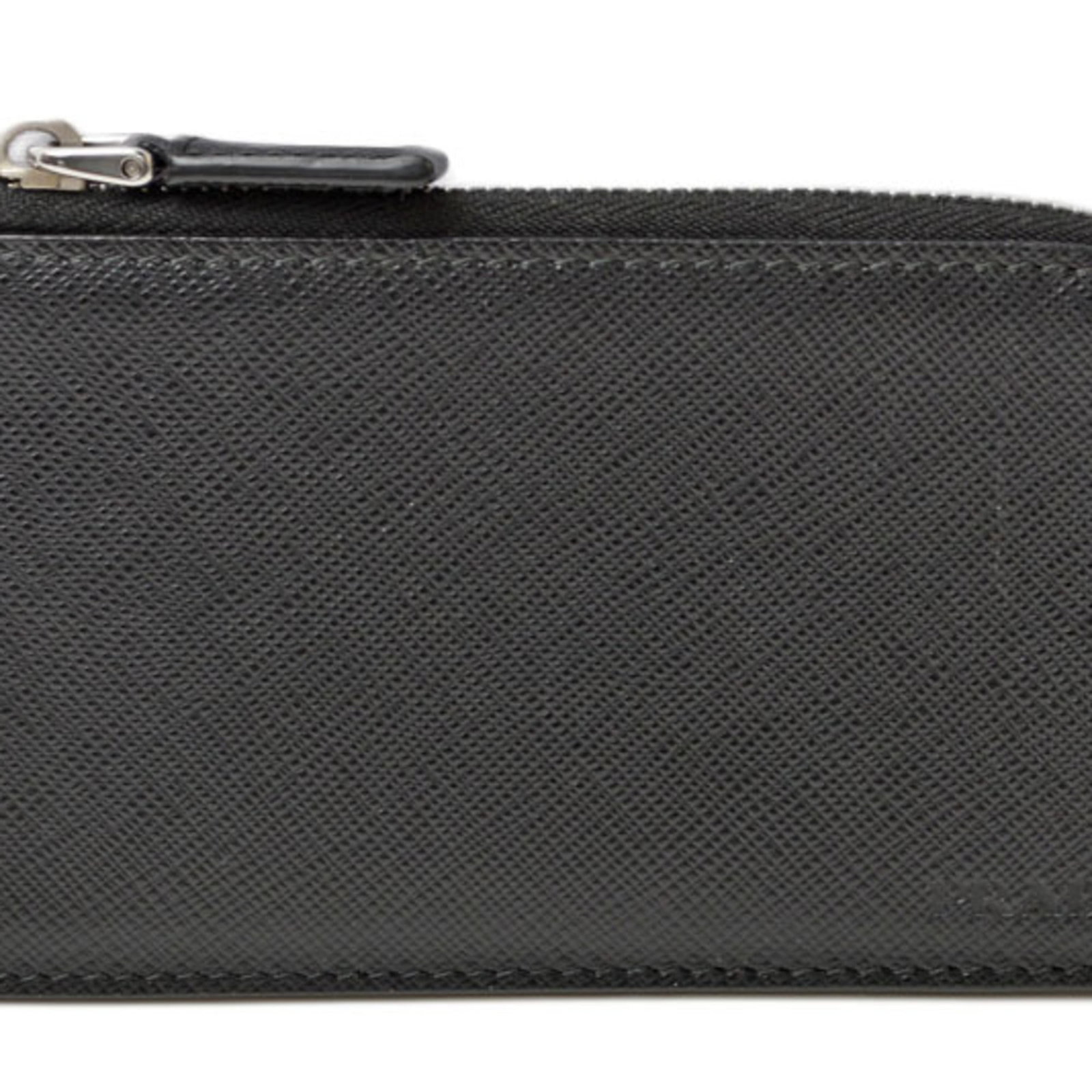 Coin purse case leather: Coin purse case leather Black leather coin purse case with a sleek design, measuring 8cm x 13.5cm x 5.00mm. Made from high-quality leather, this case features a classic style that complements any