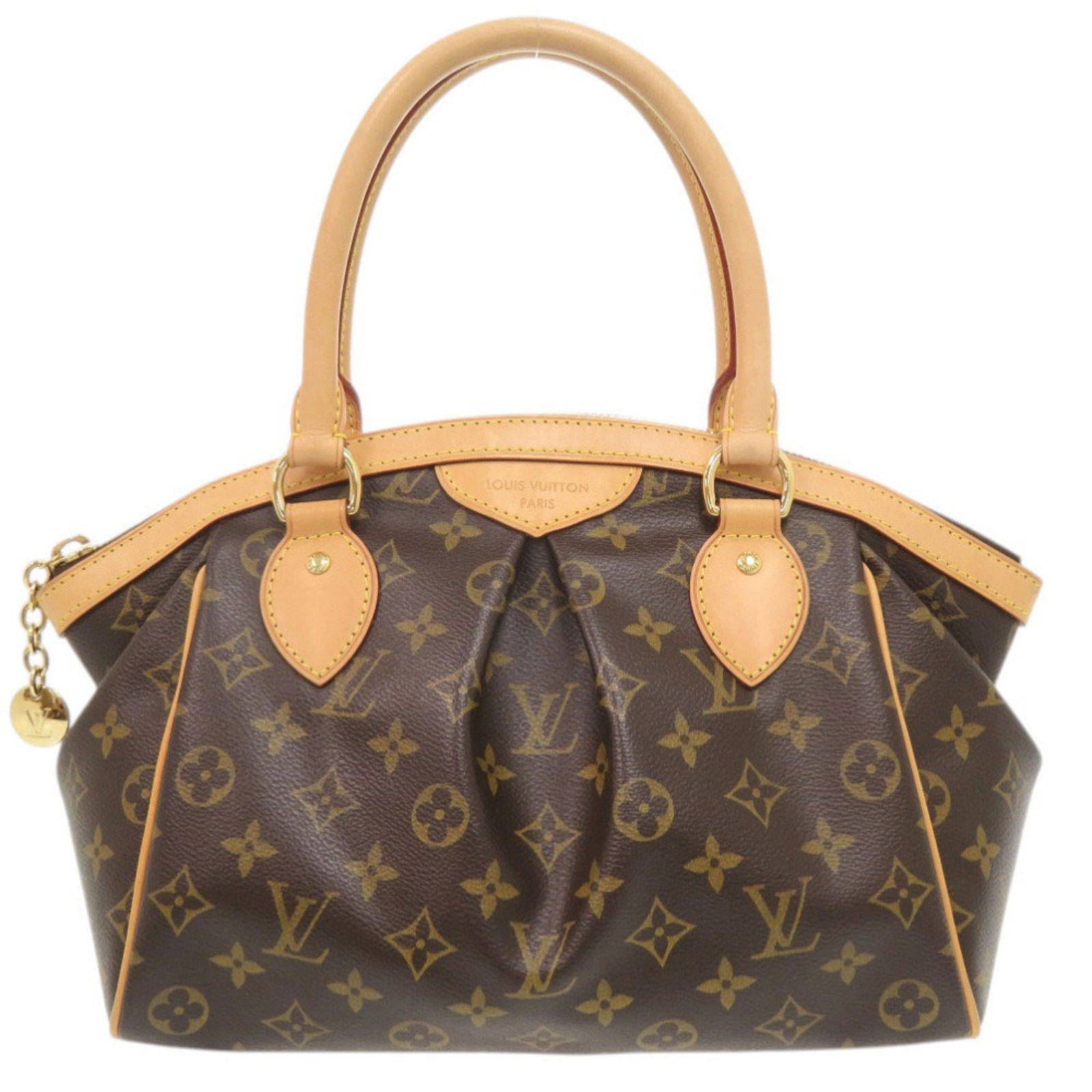Louis Vuitton Monogram Handbag: Louis Vuitton Monogram Handbag Monogrammed with iconic Louis Vuitton design, this brown monogram handbag boasts a classic French silhouette. Measuring 23cm x 29cm x 13cm, it features a timeless combin