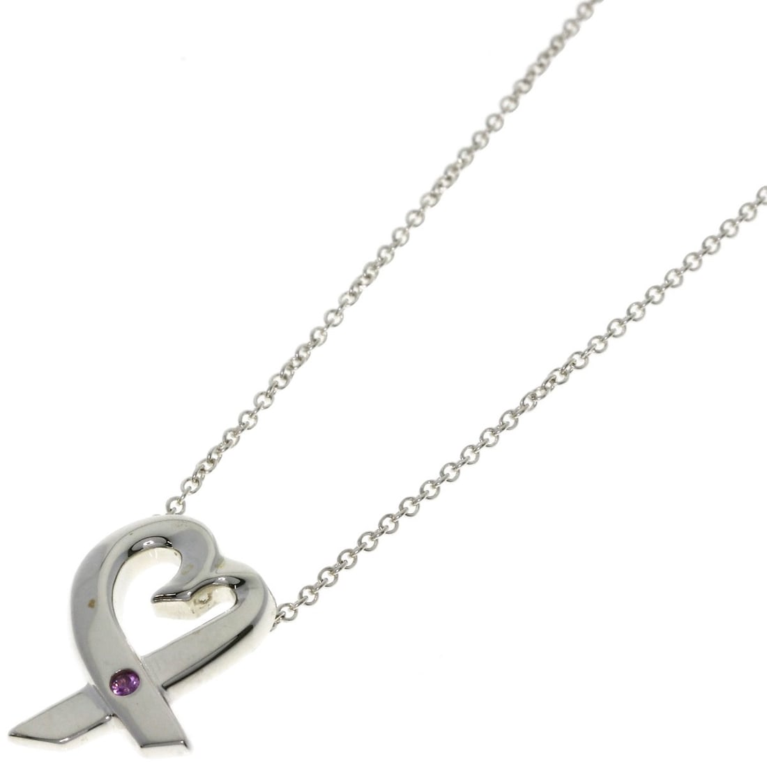 Pink Sapphire Necklace 1P Loving Heart Tiffany&Co.: Pink Sapphire Necklace 1P Loving Heart Tiffany&Co. Tiffany&Co.'s silver necklace features a stunning pink sapphire as its main stone, set against a sleek silver background. This 15.9-inch long
