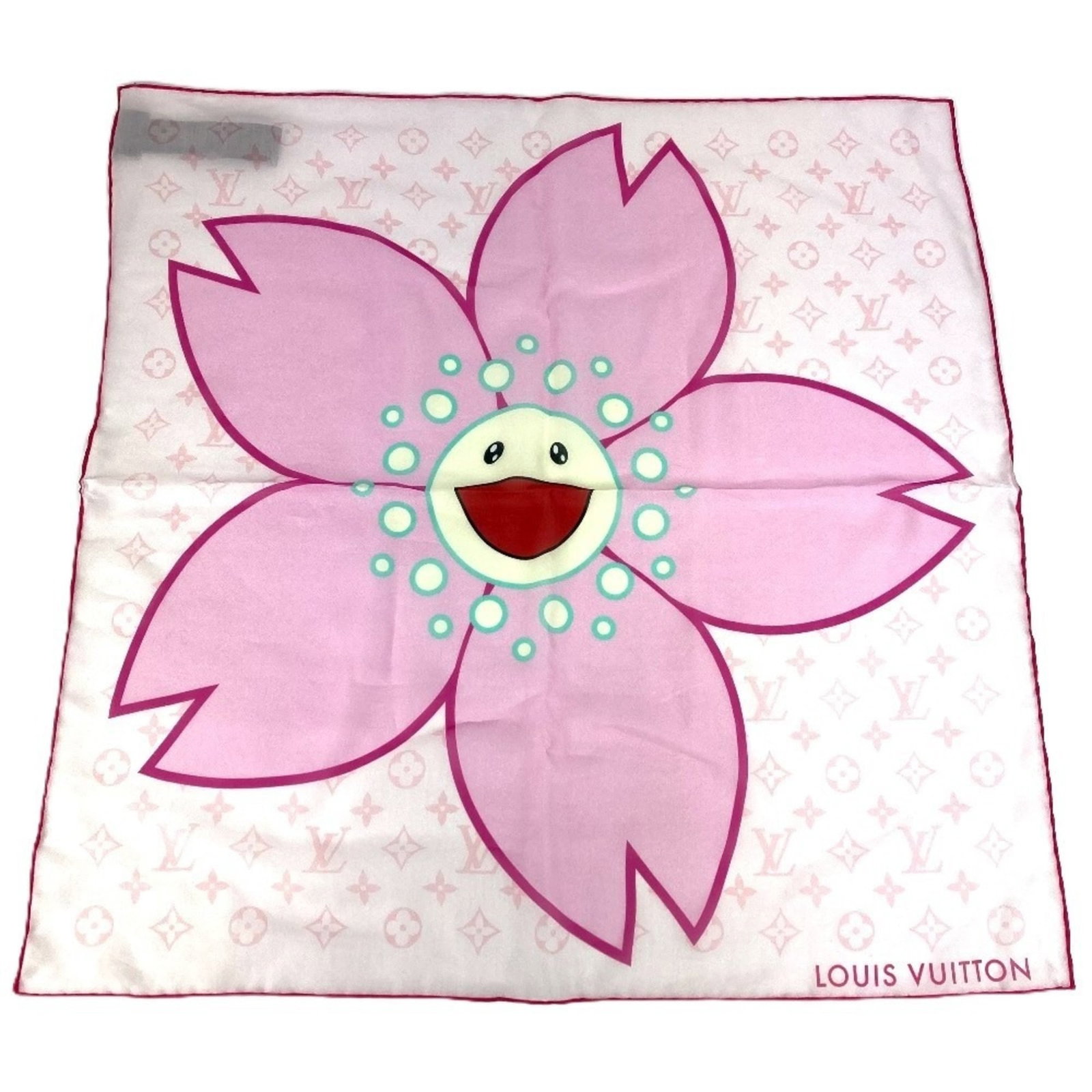 Louis Vuitton Scarf Cotton Silk: Louis Vuitton Scarf Cotton Silk Silk and cotton blend create a unique texture in this 55cm x 55cm pink scarf from Louis Vuitton. The Italian-made accessory comes in a sturdy box, providing a convenien