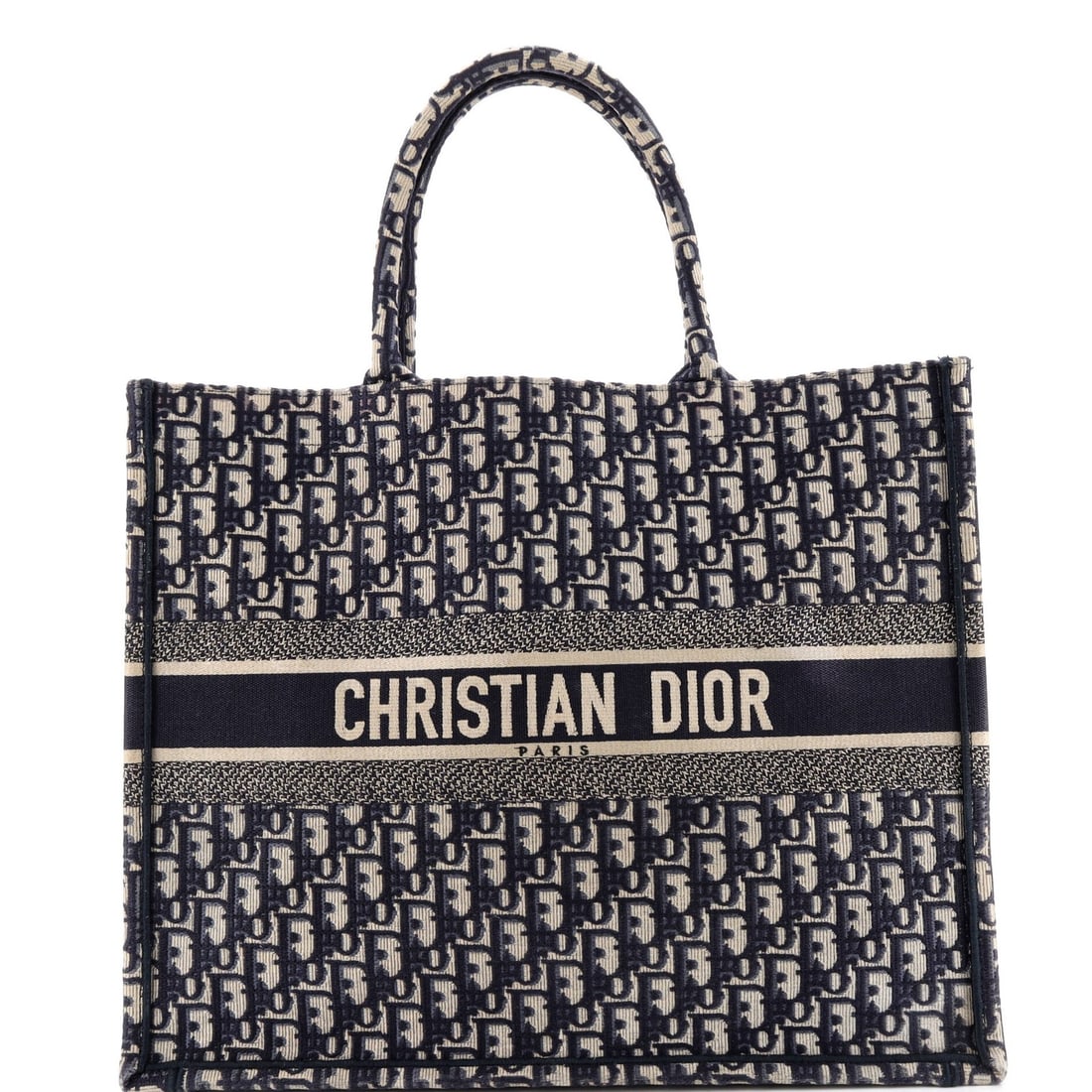 Christian Dior Oblique Canvas Large Tote Book: Christian Dior Oblique Canvas Large Tote Book The Christian Dior Oblique Canvas Large Tote Book boasts a striking blue exterior, perfectly balanced by its canvas interior. Measuring 13.5" tall and 16"