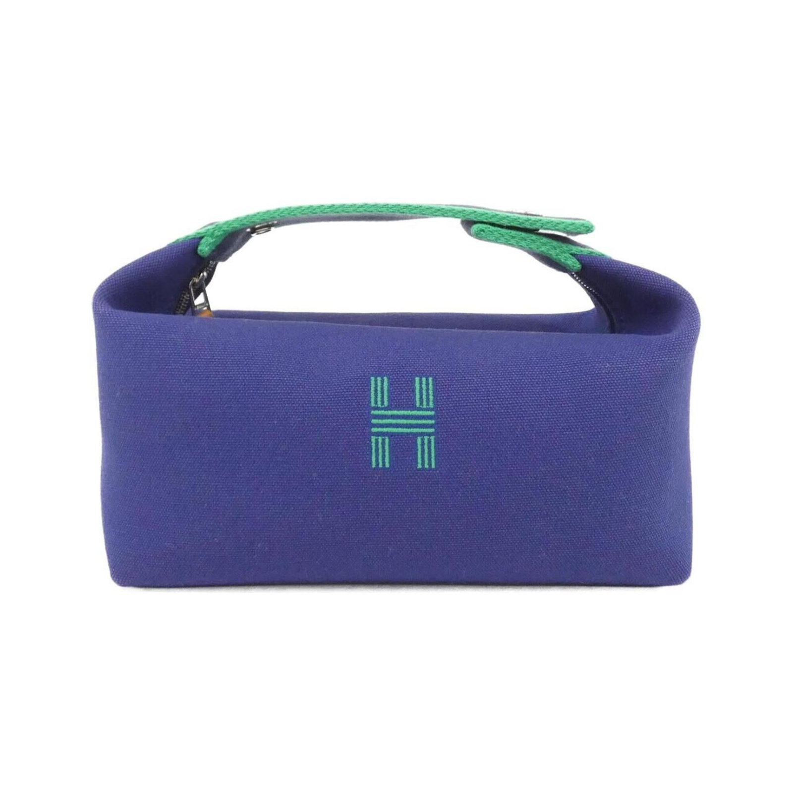 Handbag Canvas Pouch Hermes: Handbag Canvas Pouch Hermes Canvas Pouch in Marine Blue with Silver Hardware. This 103222M Hermes canvas pouch features a classic design with a marine blue color and silver hardware. Made from