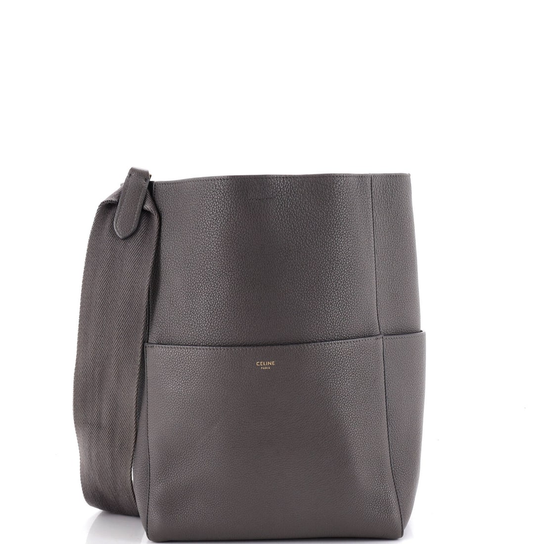 Calfskin Large Celine Sangle Seau Bag: Calfskin Large Celine Sangle Seau Bag Calfskin Large Celine Sangle Seau Bag is a large shoulder bag made from high-quality leather, featuring a gray exterior and suede interior. The bag's aged gold ha