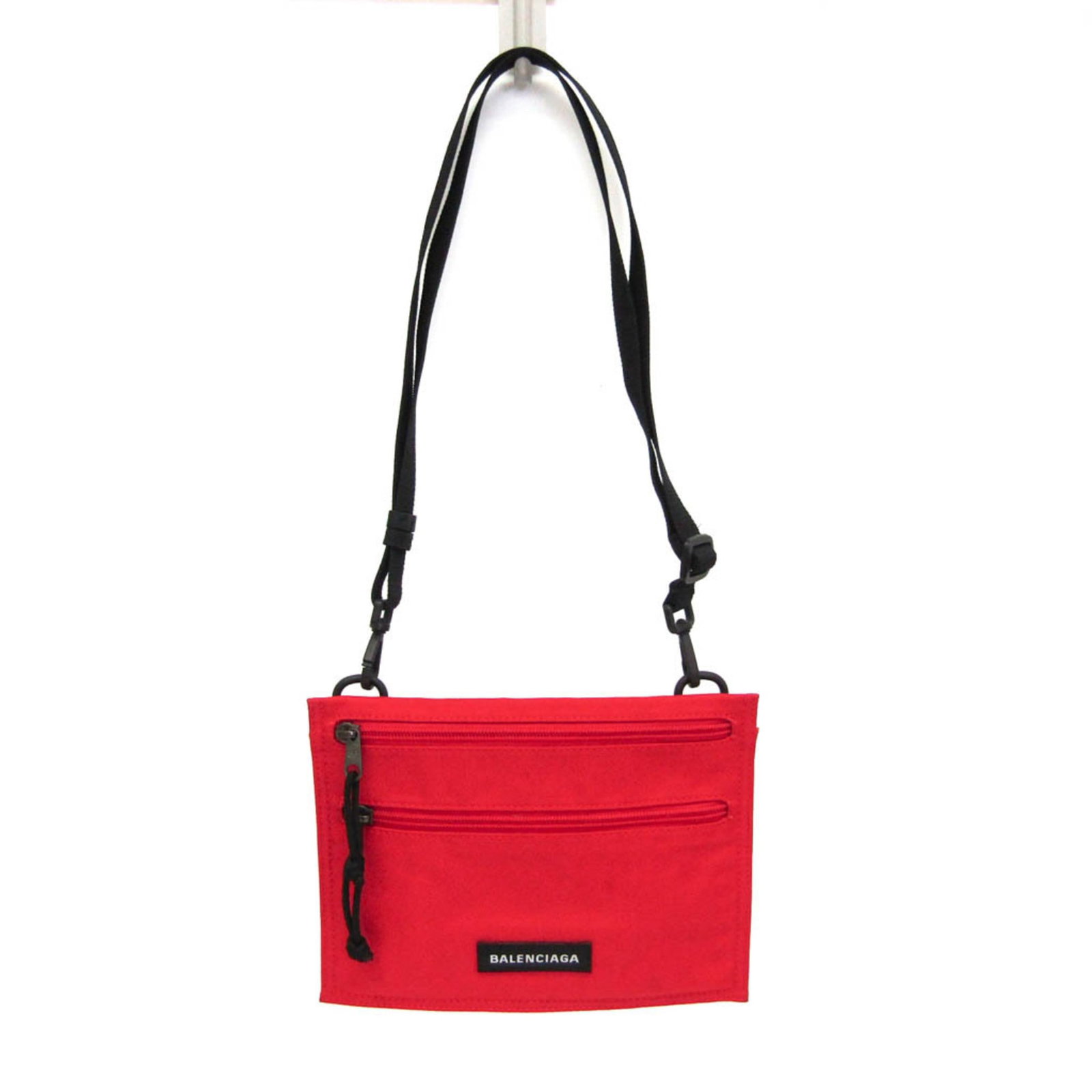Shoulder Bag Nylon Bag Pouch Balenciaga: Shoulder Bag Nylon Bag Pouch Balenciaga Red Balenciaga Explorer Shoulder Pouch with Zipper Closure and Outer Pocket, Made from Durable Nylon. This stylish shoulder bag features a bold red color and a
