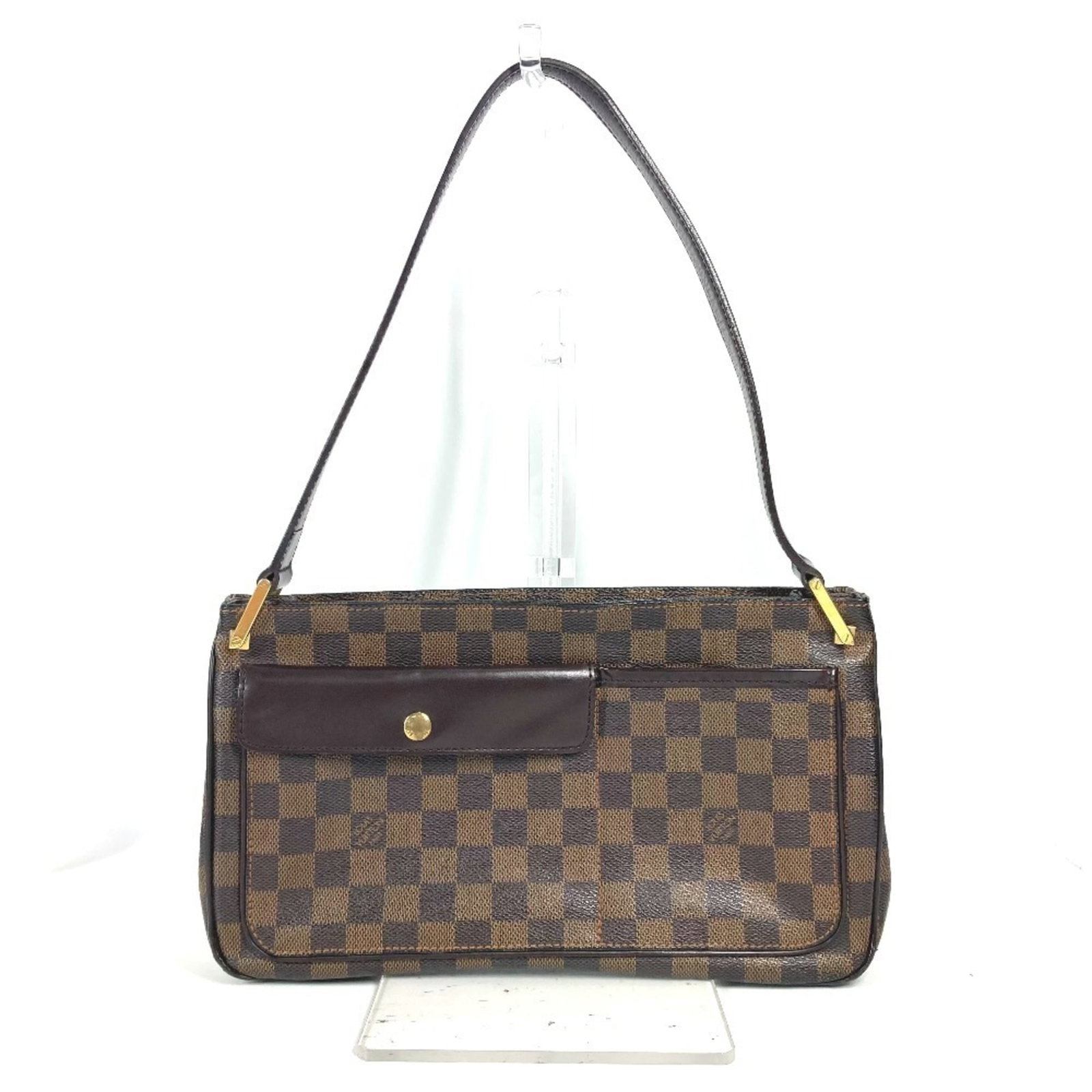 Shoulder Bag Damier Canvas By Louis Vuitton: Shoulder Bag Damier Canvas By Louis Vuitton Brown Ebene Damier Canvas shoulder bag by Louis Vuitton, measuring 17.5cm x 29cm x 6.5cm. This iconic bag features the classic Damier Canvas material, a