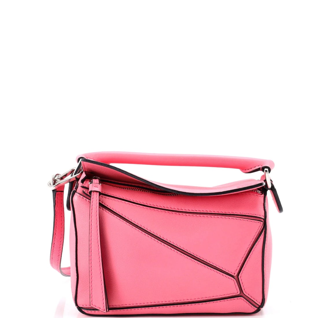 Loewe Puzzle Bag Leather Mini: Loewe Puzzle Bag Leather Mini The Loewe Puzzle Bag Leather Mini is a stylish cross-body bag with a sleek pink leather exterior and neutral interior. Measuring 4.5" tall and 7" wide, this compact bag