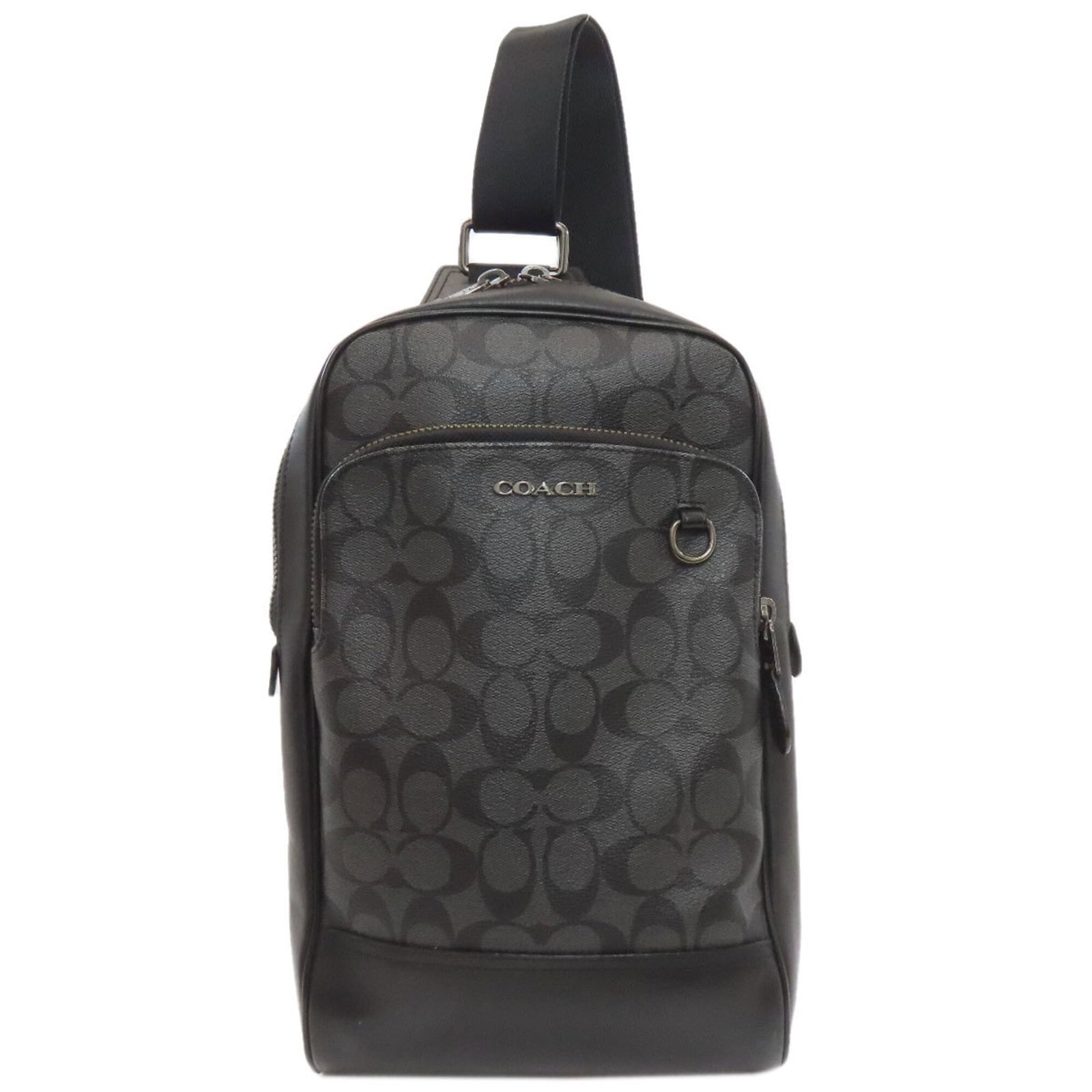 Sling Bag Coach Pvc: Sling Bag Coach Pvc The Coach Sling Bag in PVC features a sleek gray color and a sturdy zipper closure. Measuring 34cm x 20cm x 5.5cm, this compact bag is designed to be worn comfortably with adjustab