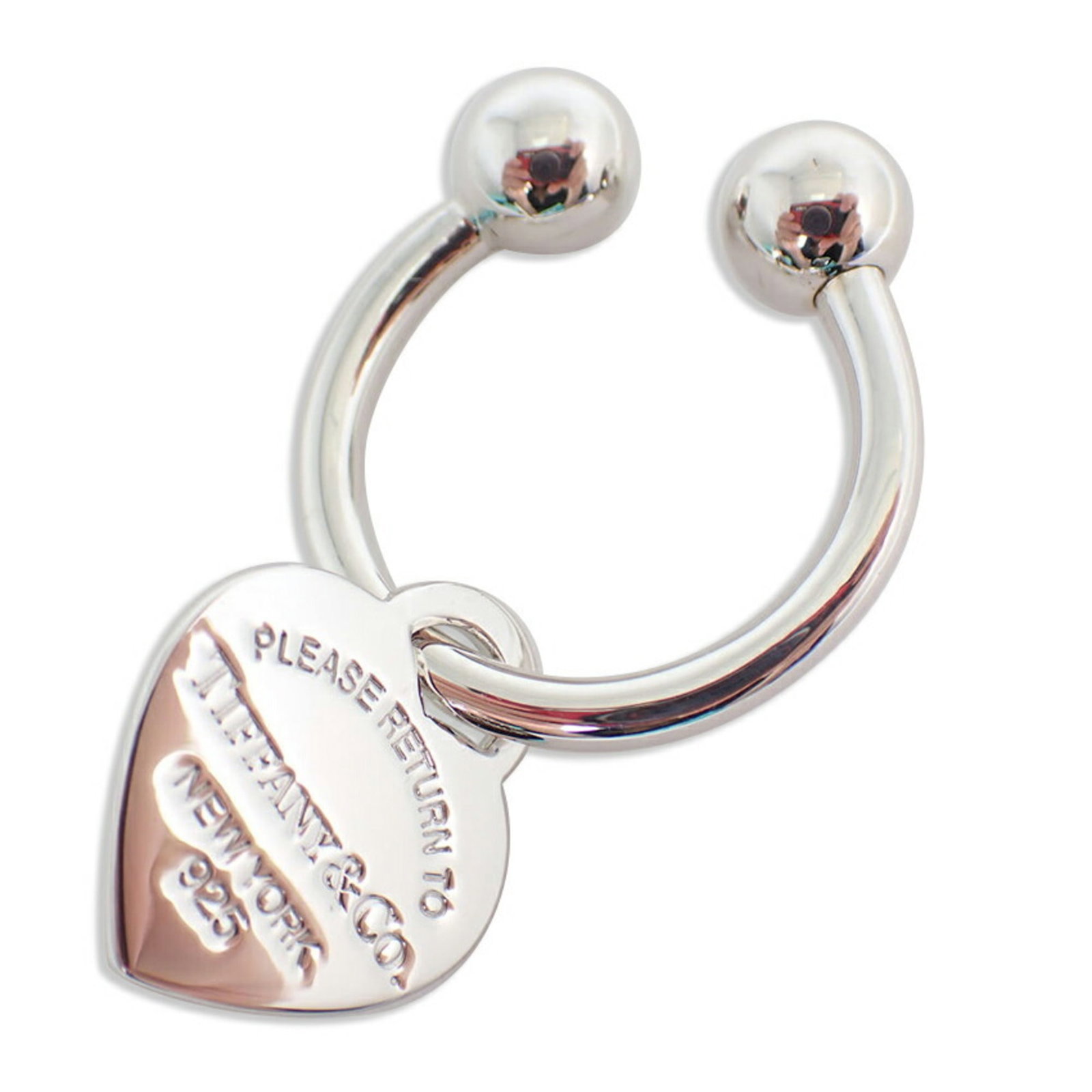 Silver Tiffany Keyring Sterling: Silver Tiffany Keyring Sterling Silver Tiffany Keyring Sterling is a sterling silver 925 keyring made by Tiffany, measuring 2.5cm x 2.1cm. This keyring bears a signature and is made of high-quality