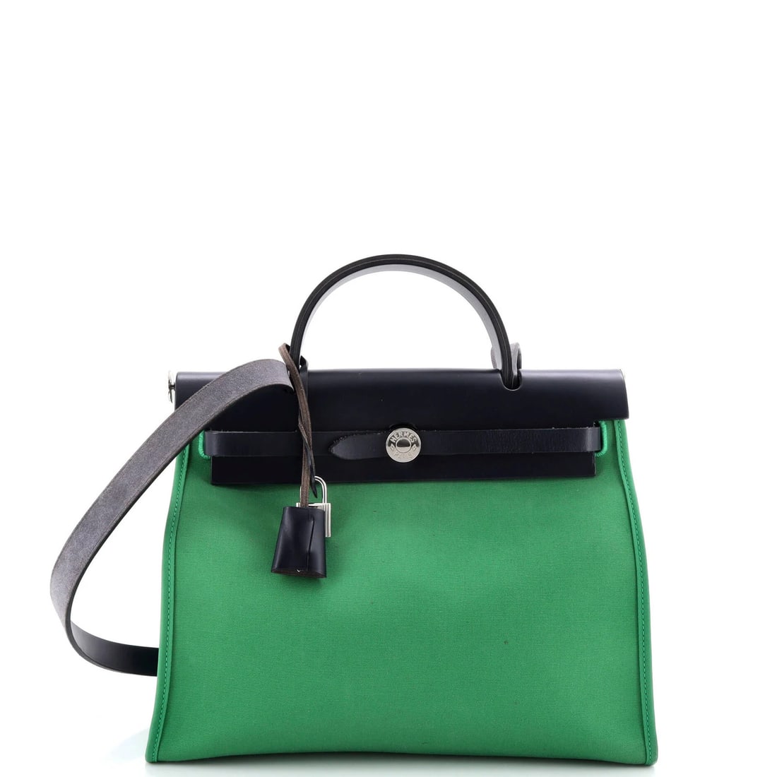 Herbag Hermes Leather Toile 31 Zip: Herbag Hermes Leather Toile 31 Zip The Herbag Hermes Leather Toile 31 Zip is a stylish shoulder bag featuring a unique blend of leather and canvas materials. Its exterior is adorned with a striking