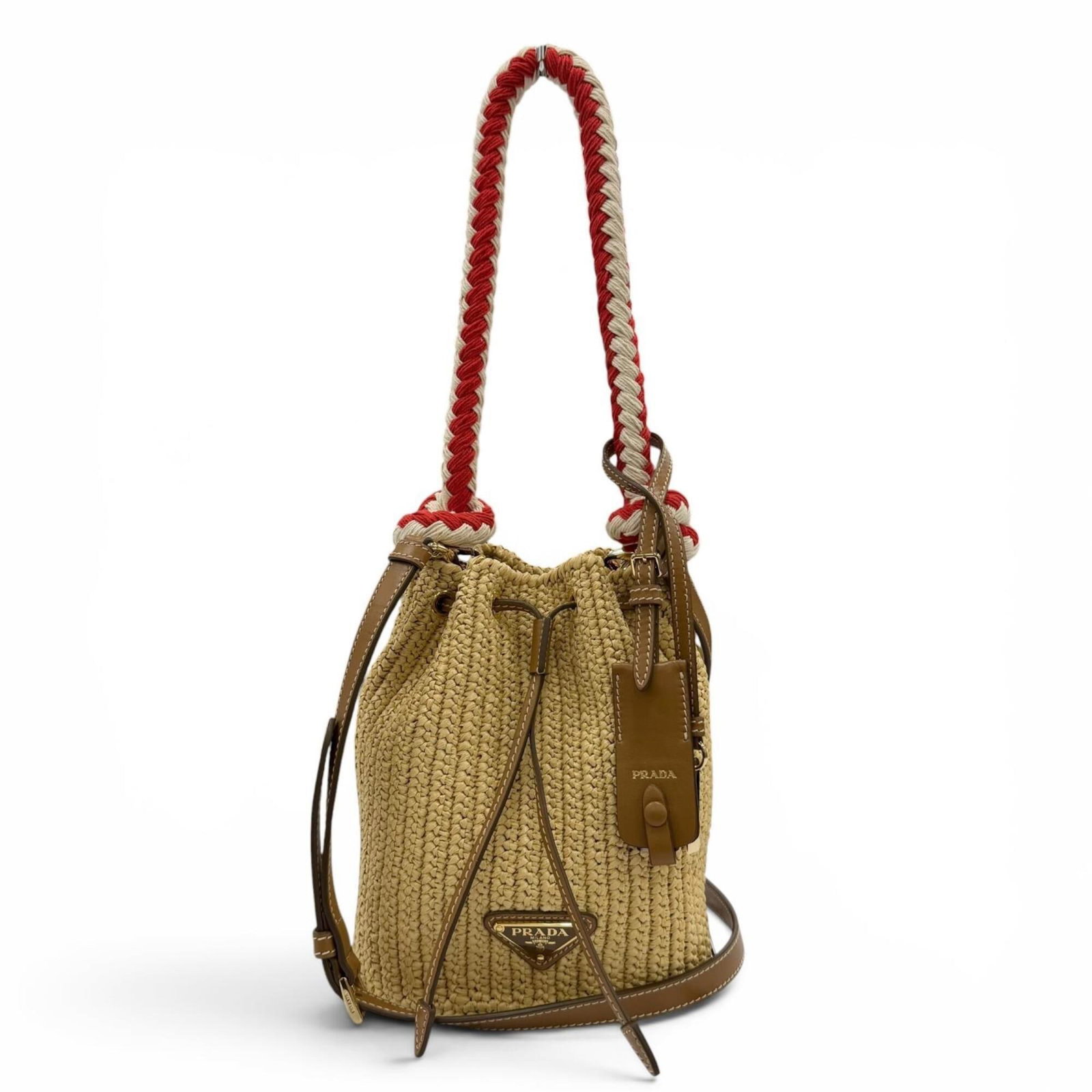 Raffia Leather Handbag Shoulder Prada: Raffia Leather Handbag Shoulder Prada This Prada Country handbag features a unique blend of leather and raffia materials, showcasing a distinctive design element. With its compact size and shoulder st