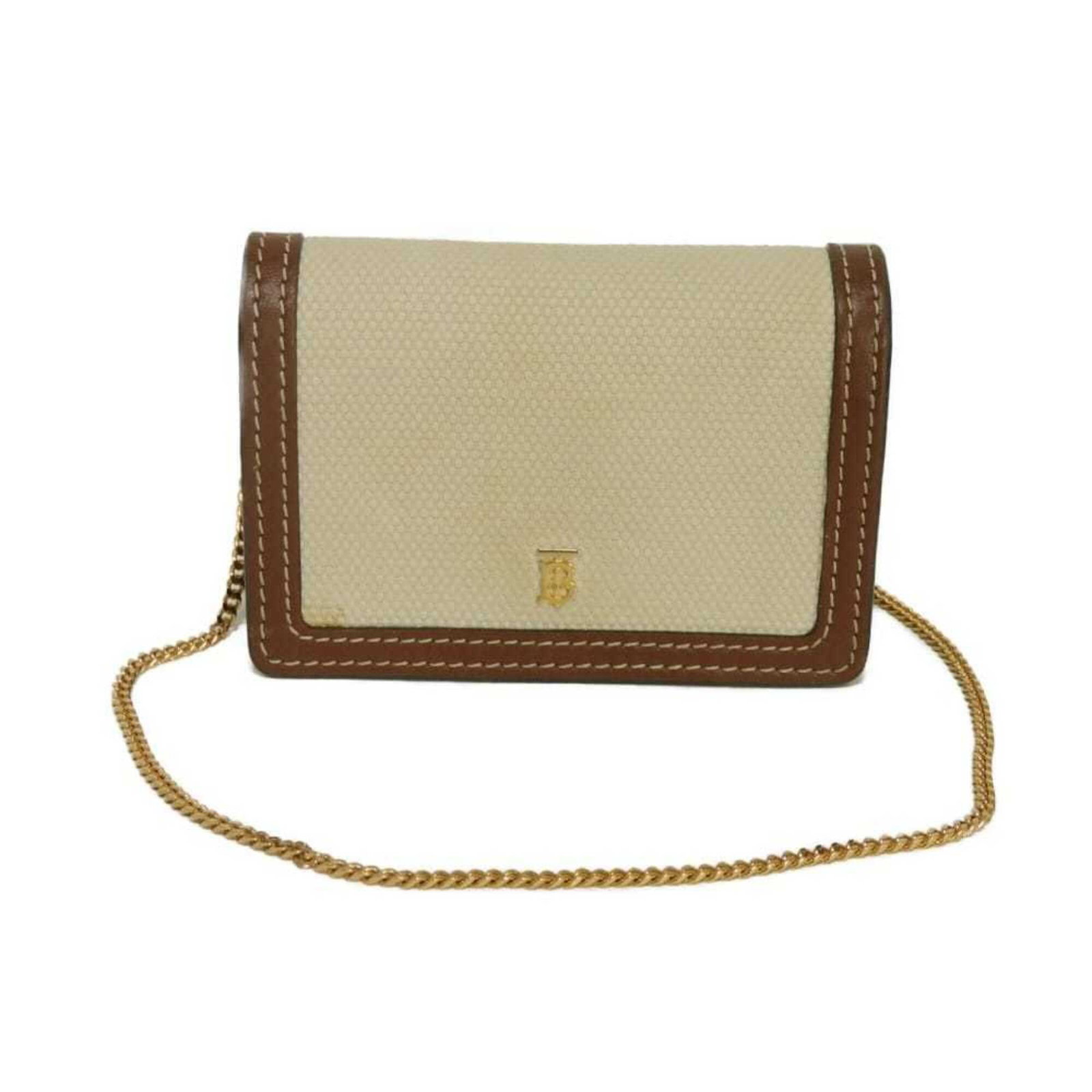 Bi fold canvas wallet: Bi fold canvas wallet Canvas wallet with a bi-fold design, made from high-quality canvas material in a classic beige and brown color combination. The wallet measures 6.5cm x 10cm x 2.8cm, making it a