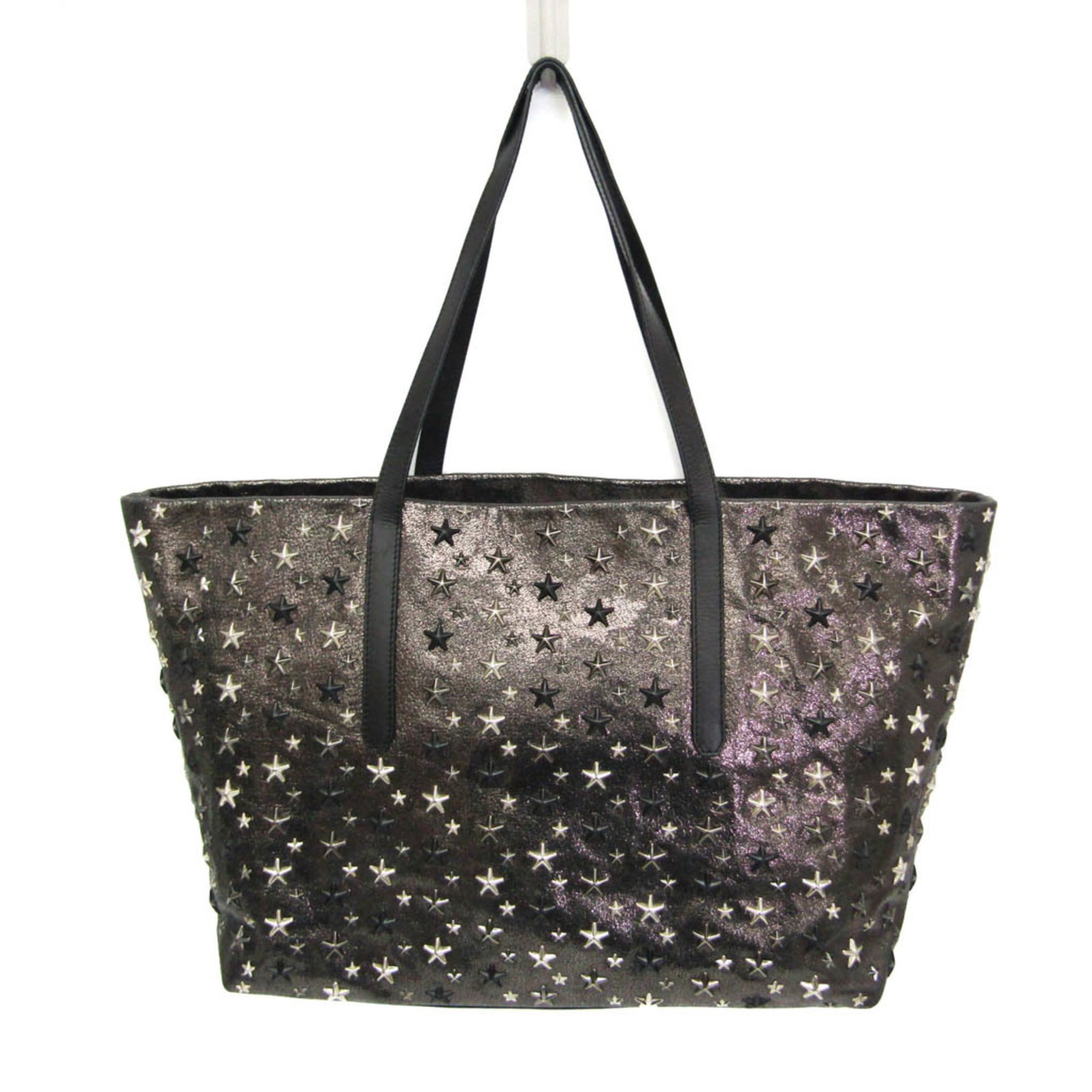 Tote Bag Leather Jimmy Choo: Tote Bag Leather Jimmy Choo Tote bag made from high-quality leather, featuring a metallic black finish. This stylish and functional bag measures 29cm x 38cm x 16.5cm and weighs 920g, making it a