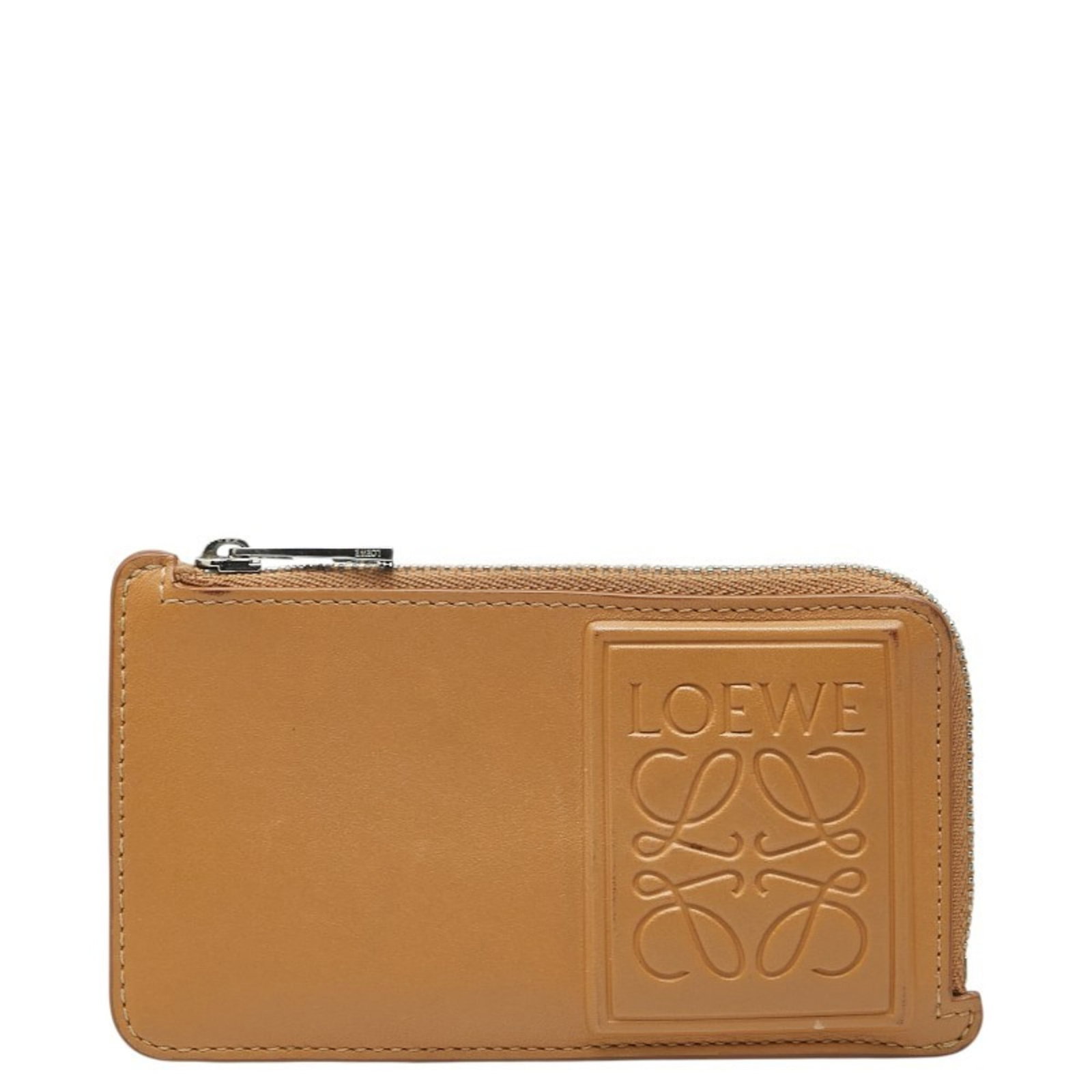 Card Case Leather by Loewe: Card Case Leather by Loewe Card case by Loewe in beige leather, measuring 7cm x 12.5cm x 1cm. This compact leather card case features a simple design, showcasing the quality of the beige leather mater