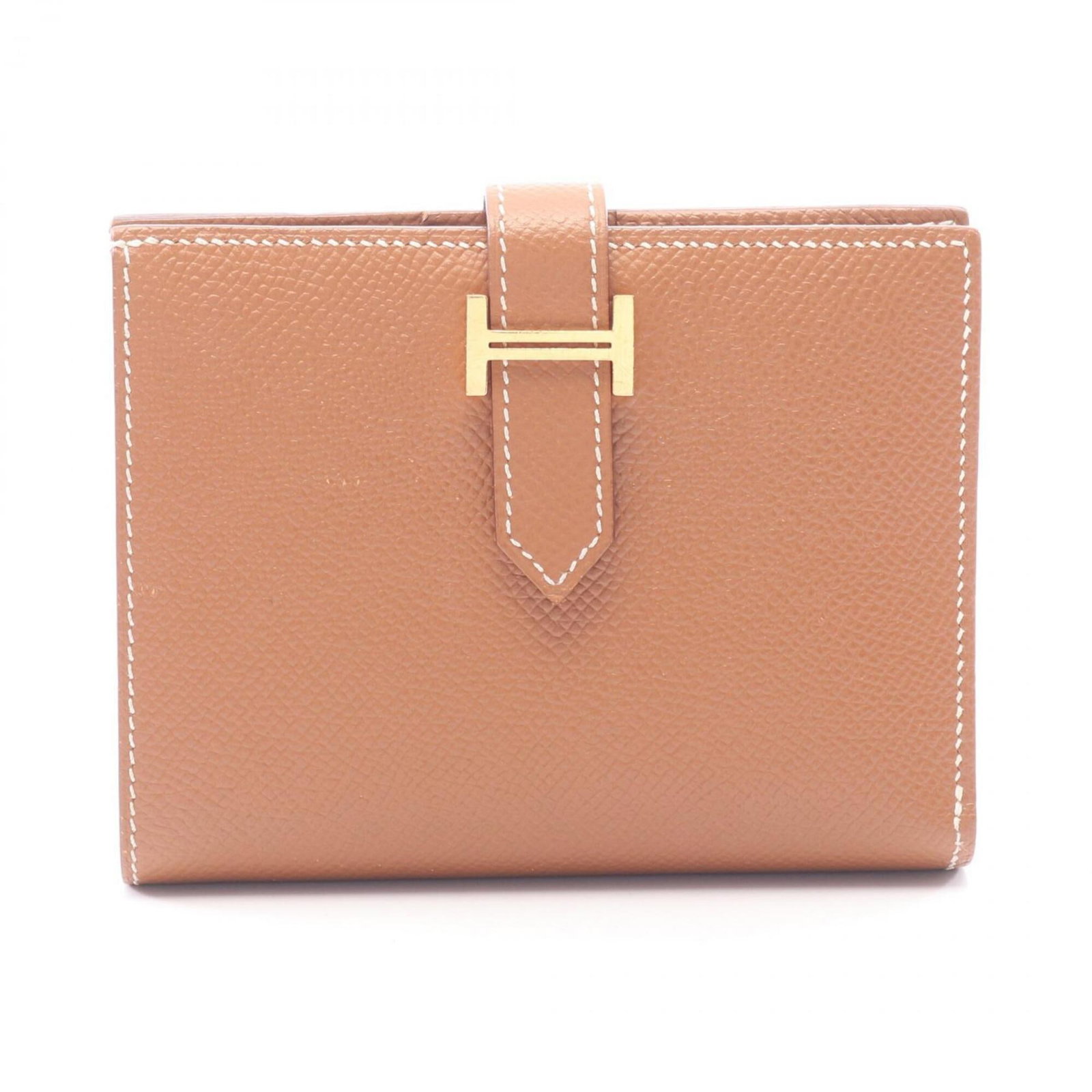 Bi fold Epsom Leather Hermes Wallet: Bi fold Epsom Leather Hermes Wallet Epsom leather gives this bi-fold wallet a rich, luxurious feel. The classic design and timeless brown color make it a versatile accessory for everyday use. With