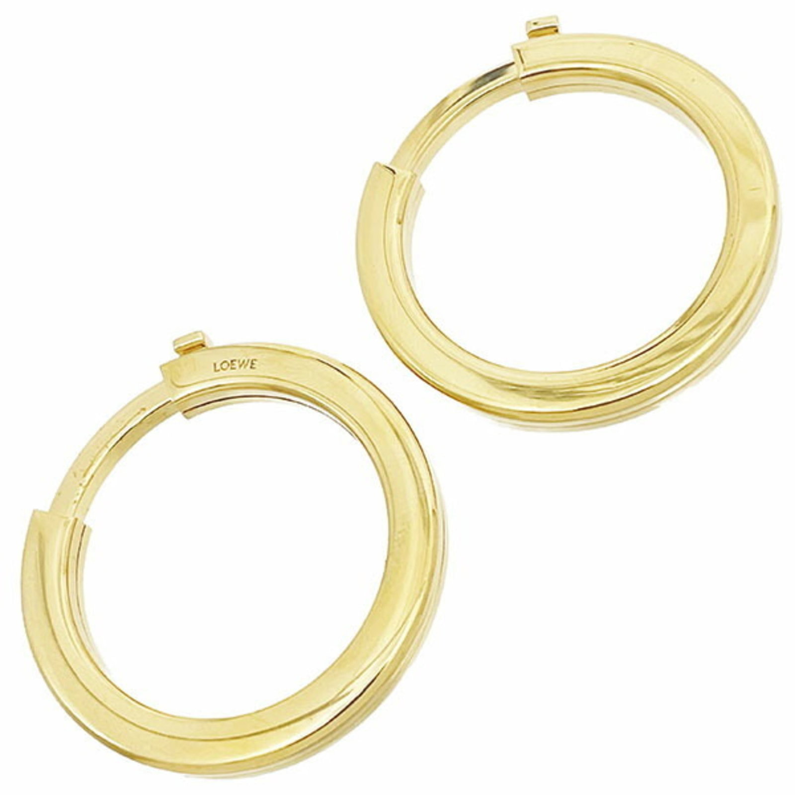 Keyring brass Loewe: Keyring brass Loewe Silver brass Loewe keyring, made from high-quality brass, is a stylish accessory for everyday use. This elegant keyring is a testament to Loewe's expertise in crafting luxurious it