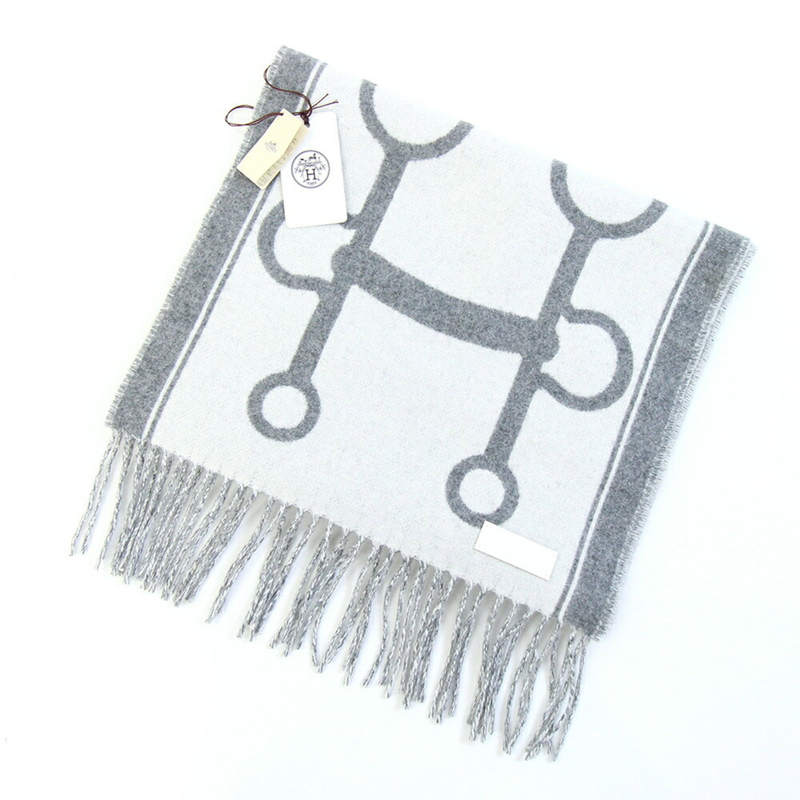 Hermes Stole Cashmere: Hermes Stole Cashmere Cashmere stole from the renowned French fashion house Hermes, crafted from 100% cashmere material, with a sleek black and gray color palette. Measuring 1.59m x 31.5cm, this