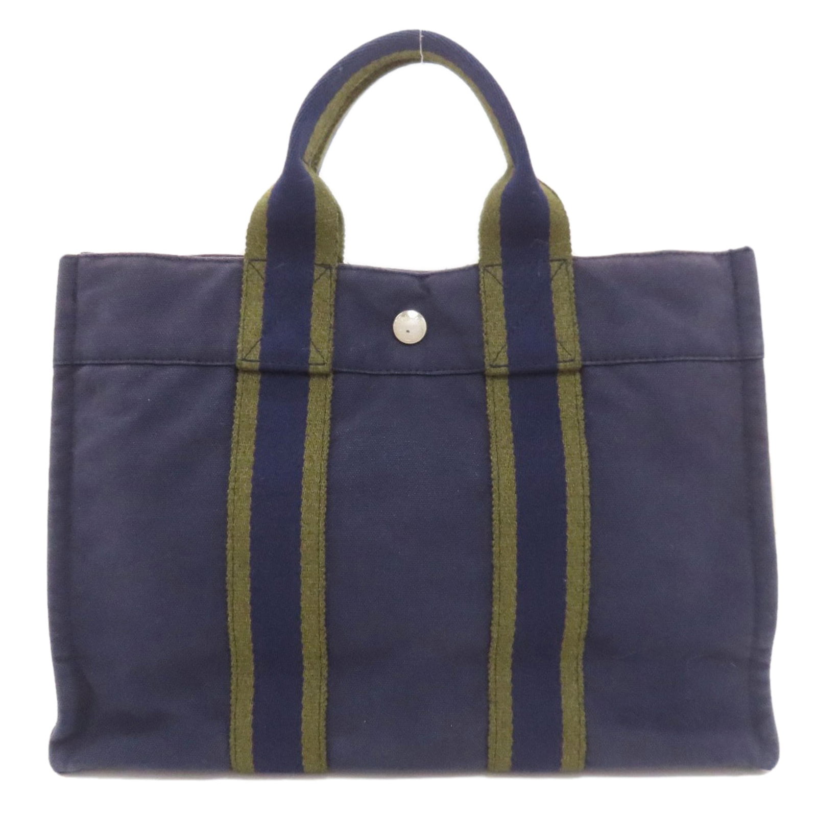 Handbag Canvas: Handbag Canvas Canvas handbag from Hermes, featuring a navy color and 22cm long handle. This canvas handbag measures 22cm x 30cm x 9cm and has a sturdy design. The canvas material provides a durable a