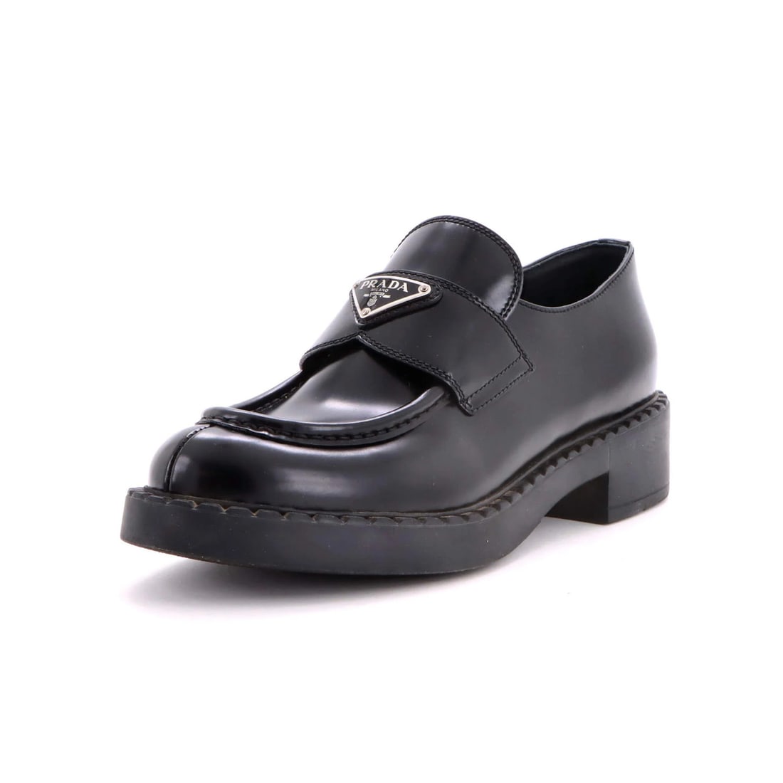 Women's Triangle Logo Loafers Spazzolato Leather Prada: Women's Triangle Logo Loafers Spazzolato Leather Prada Black Spazzolato Leather Prada Women's Triangle Logo Loafers in US size 9. Featuring a striking triangle logo, these loafers boast premium