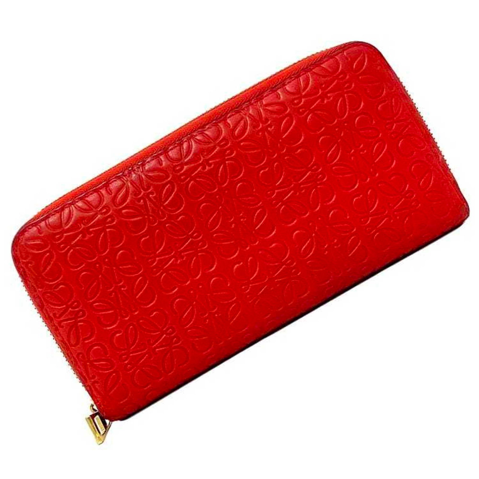 Loewe Coin Purse/ Coin Case Leather: Loewe Coin Purse/ Coin Case Leather The Loewe Coin Purse is a sleek and stylish leather accessory, boasting a striking red color and open closure. Measuring 10cm x 19cm x 2cm, it provides a
