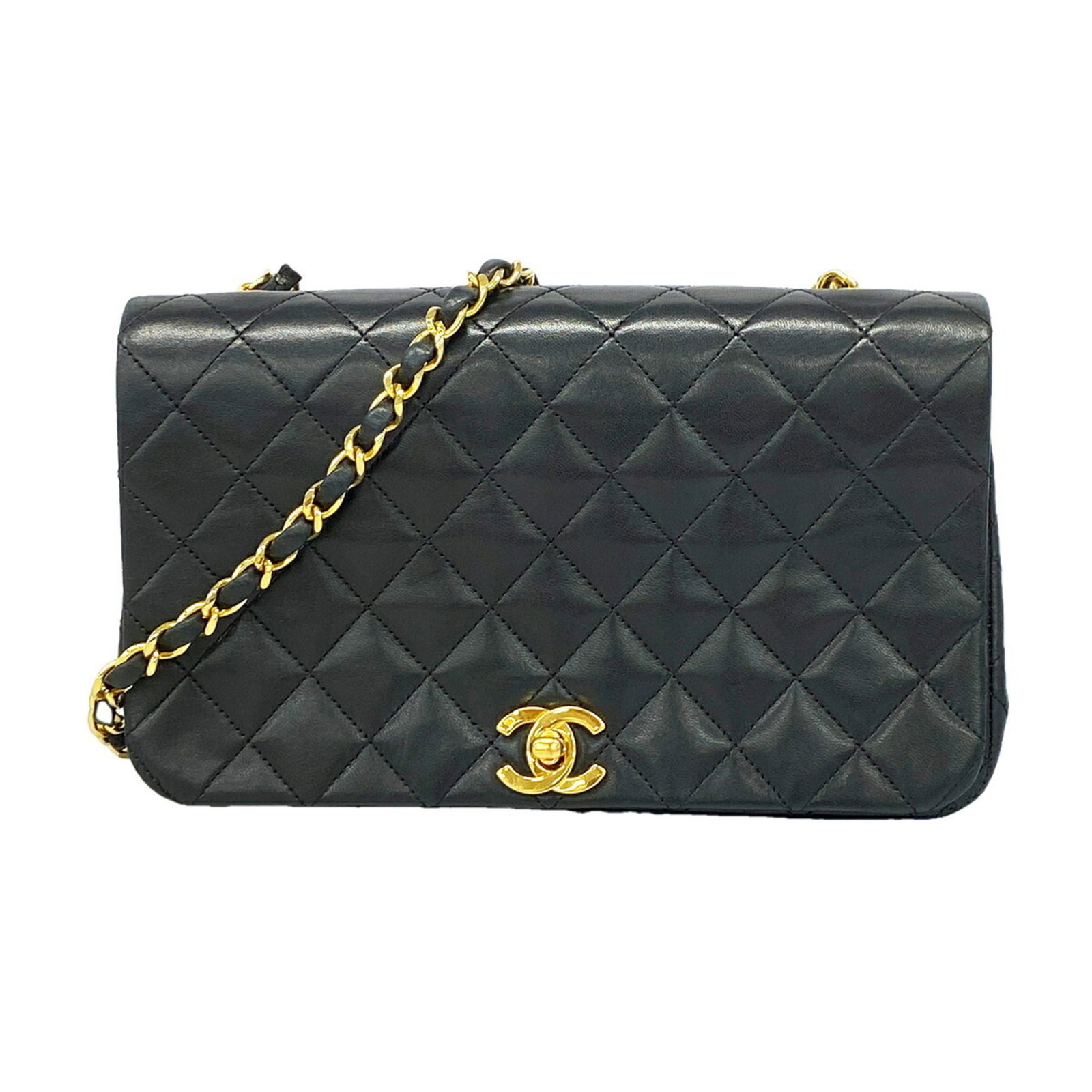 Shoulder Bag Leather Chanel: Shoulder Bag Leather Chanel Black leather shoulder bag from Chanel, featuring lambskin material and gold hardware. The bag measures 14cm x 23cm x 6cm and has a sleek, classic design. Made from