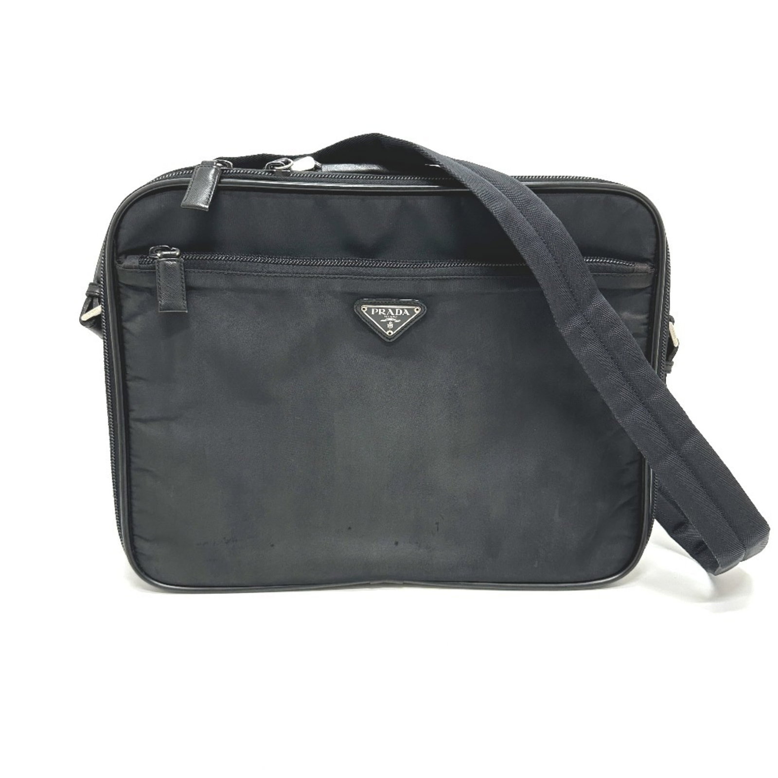 Shoulder Bag Nylon Prada Briefcase: Shoulder Bag Nylon Prada Briefcase Black Nylon Prada Briefcase, 28cm x 38cm x 8cm, made from durable nylon material, features a sleek and modern design. This shoulder bag briefcase is a versatile and