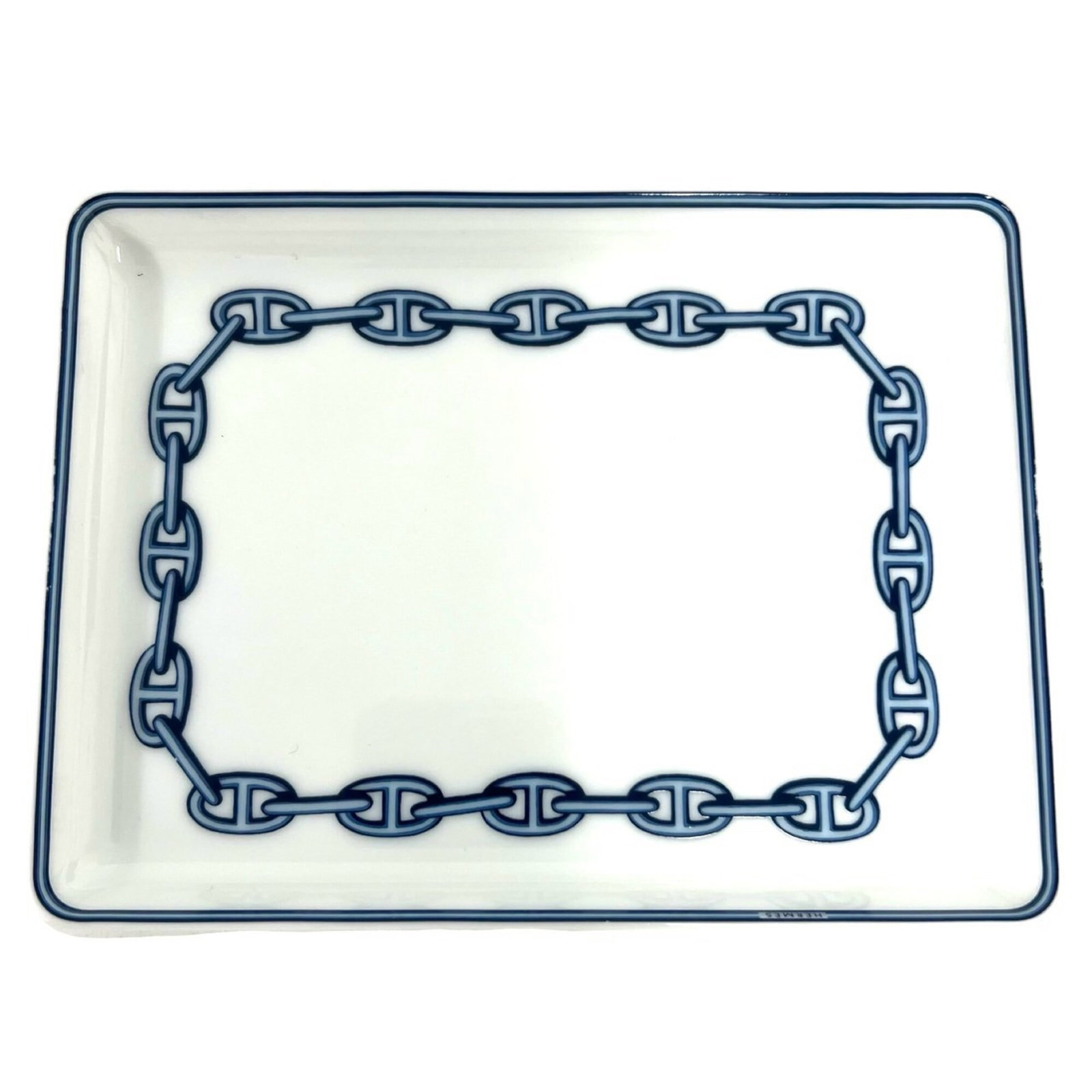Hermes Others: Hermes Others The Hermes Others features a striking blue and white design, measuring 12cm x 16cm x 1.5cm. This compact item showcases a unique aesthetic, with its size and coloration making it a visua