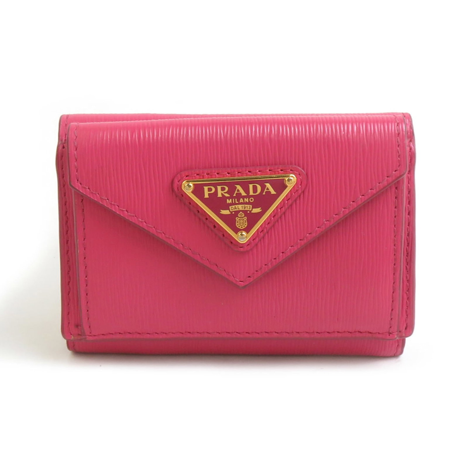 Prada Wallet (Tri-Fold) Leather: Prada Wallet (Tri-Fold) Leather The Prada Country of Origin Turkey tri-fold leather wallet features a striking pink color and a compact size, measuring 7cm x 10cm x 3cm. Made from high-quality