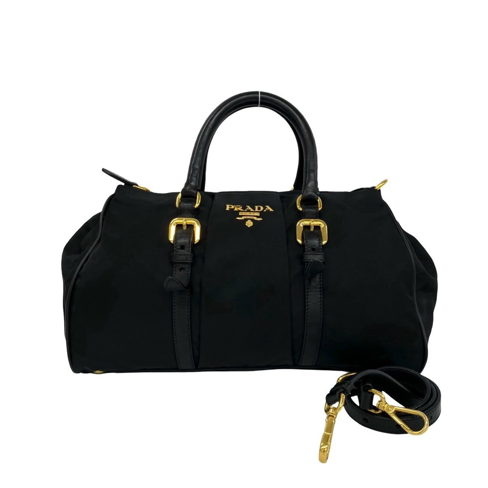 Prada Handbag Shoulder Bag Tote Bag Nylon Leather: Prada Handbag Shoulder Bag Tote Bag Nylon Leather Nylon and leather combine in this sleek black Prada shoulder bag tote, measuring 20cm x 31cm x 11.5cm. The bag's durable nylon exterior is complemente