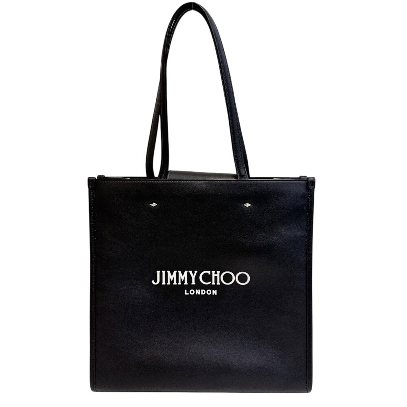 Tote Bag Leather Jimmy Choo: Tote Bag Leather Jimmy Choo Black leather tote bag from Jimmy Choo, measuring 30cm x 31cm x 6cm, offering a sleek and stylish accessory. This tote bag features high-quality leather construction and a 