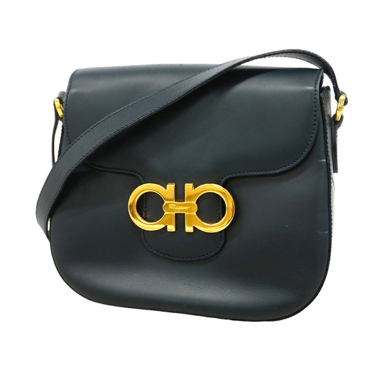 Ferragamo Leather Shoulder Bag: Ferragamo Leather Shoulder Bag Navy leather shoulder bag with gold hardware, measuring 19cm x 21cm x 7.5cm, perfect for everyday use. This classic design features high-quality leather construction
