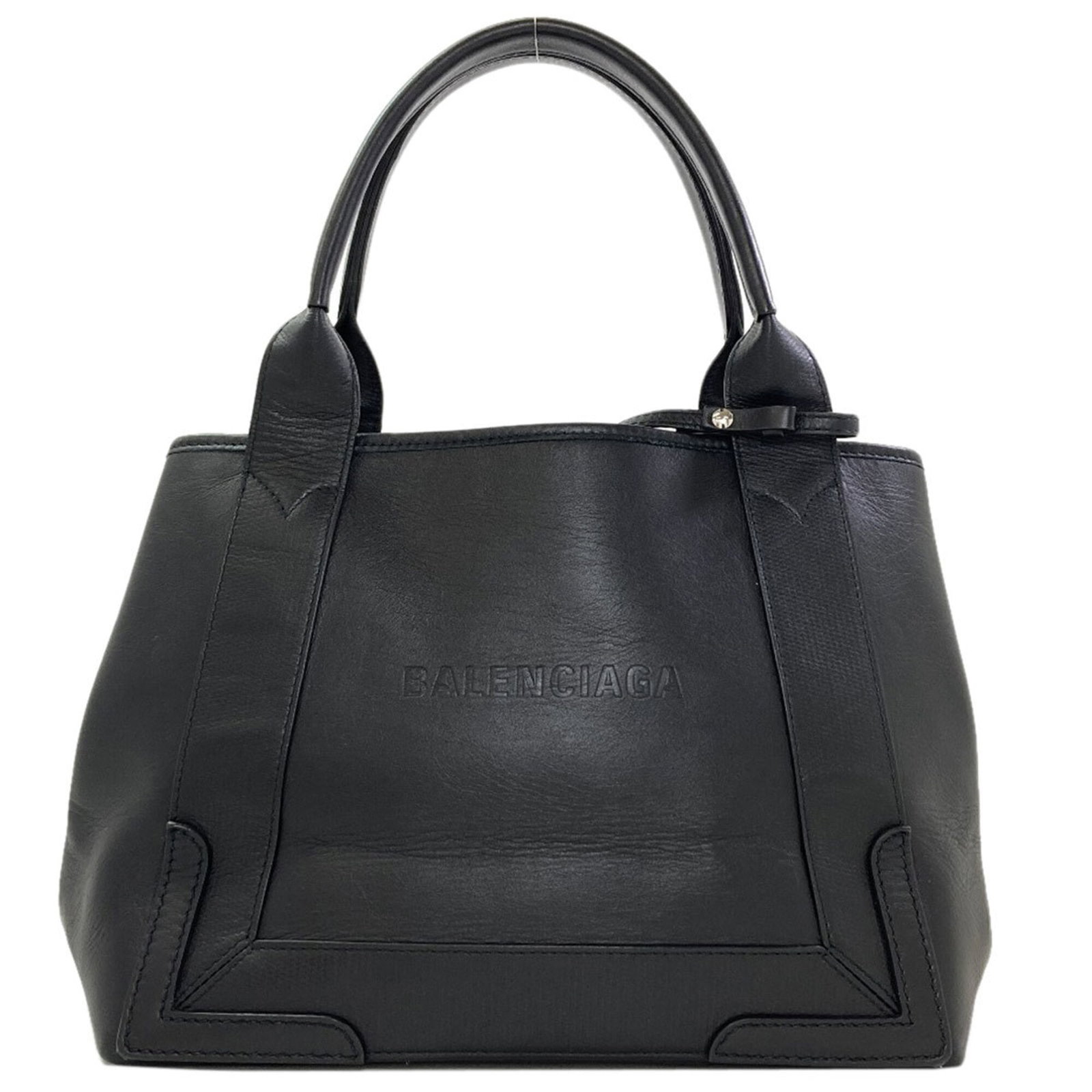 Handbag Leather Balenciaga: Handbag Leather Balenciaga Balenciaga's sleek and sophisticated handbag boasts a rich black leather exterior, crafted from high-quality calfskin. Measuring 23cm x 30cm x 18cm, this stylish accessory