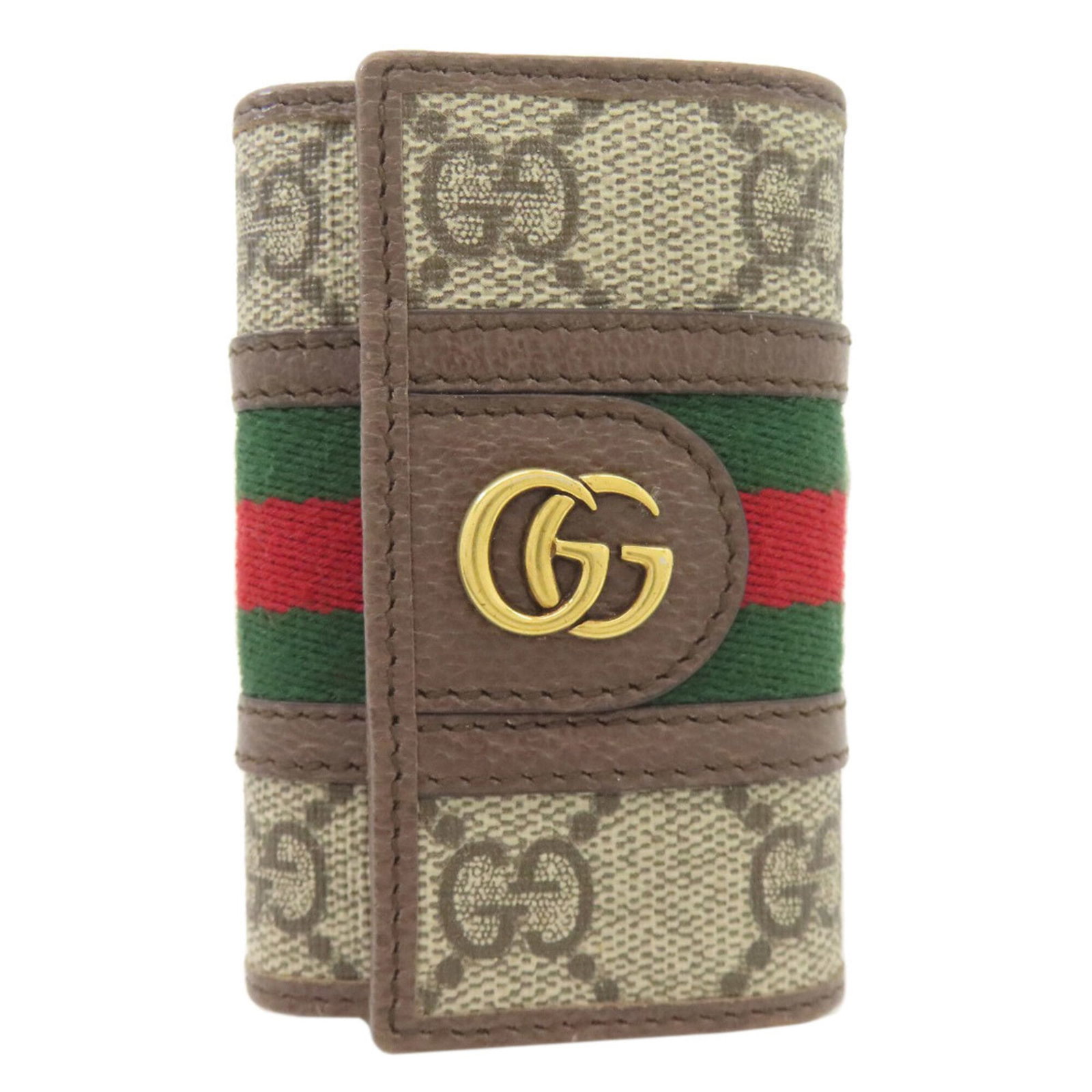 Pvc keycase gucci: Pvc keycase gucci This Gucci PVC keycase is a compact and stylish accessory, measuring 9.5cm x 7cm x 2cm, with a brown color and made from PVC material. The keycase bears a signature, and its sleek de
