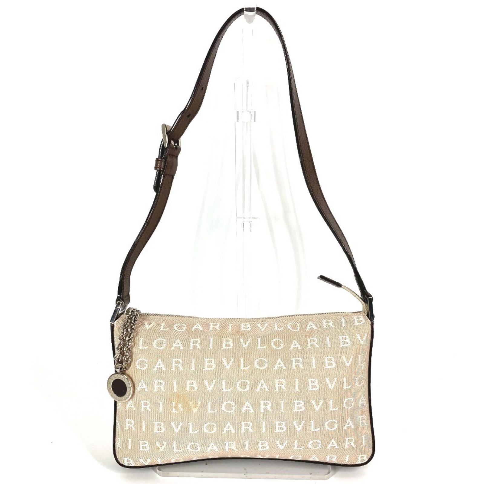 Canvas Leather Bag Shoulder Bvlgari: Canvas Leather Bag Shoulder Bvlgari Canvas Leather Bag by Bvlgari features a unique blend of canvas and leather materials, with a beige and brown color combination. The bag's design is characterized