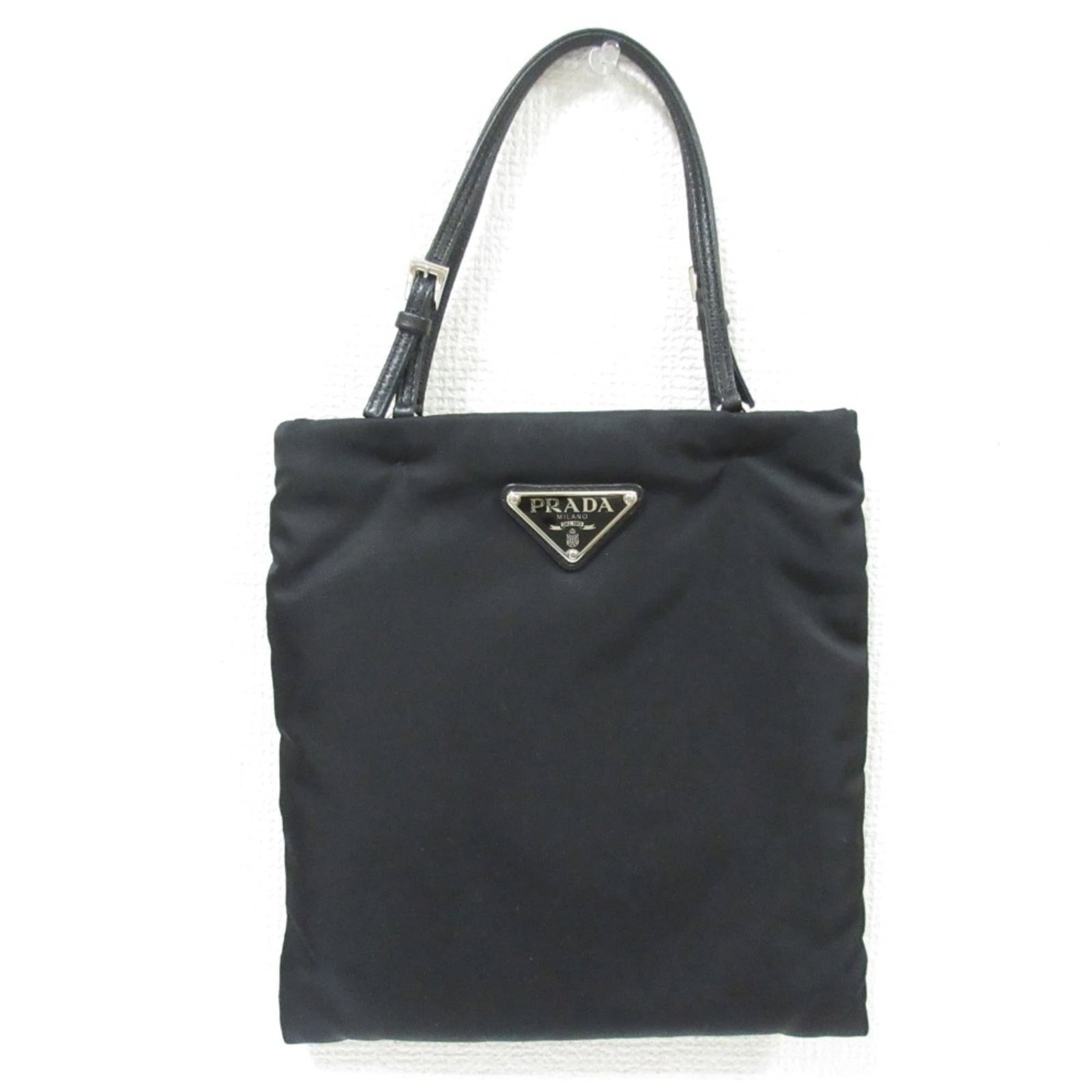 Shoulder Bag Nylon: Shoulder Bag Nylon Black Nylon Shoulder Bag with 22cm x 21cm Dimensions. This Prada MPN 1BA252 shoulder bag features a sleek and modern design made from high-quality nylon material. Its compact size