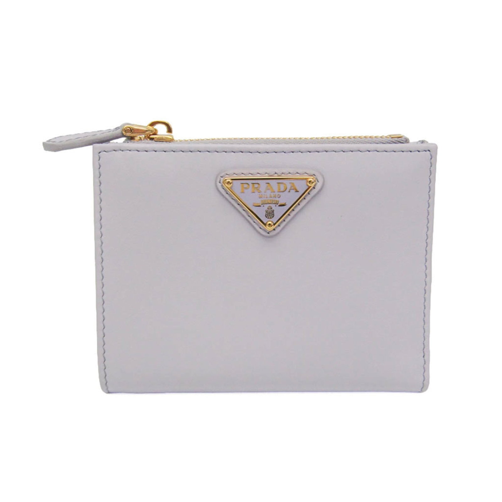Bi fold leather wallet: Bi fold leather wallet The Prada bi-fold leather wallet boasts a sleek design with a light purple hue, featuring a snap fastener closure and a spacious inner pocket with bill and card slots. A conveni