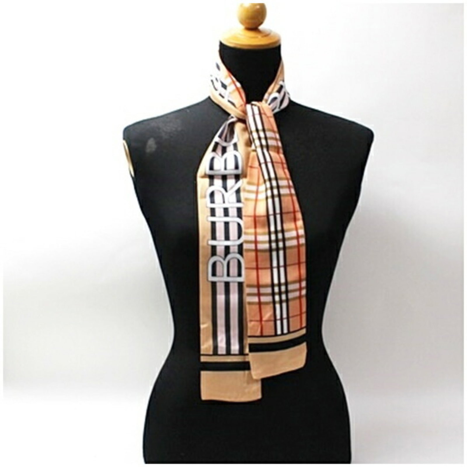 Silk Burberry Scarf: Silk Burberry Scarf Silk Burberry Scarf in a vibrant pink hue, crafted from high-quality silk with a 1.18m x 8cm size that adds a touch of elegance to any outfit. The scarf's classic design and luxuri