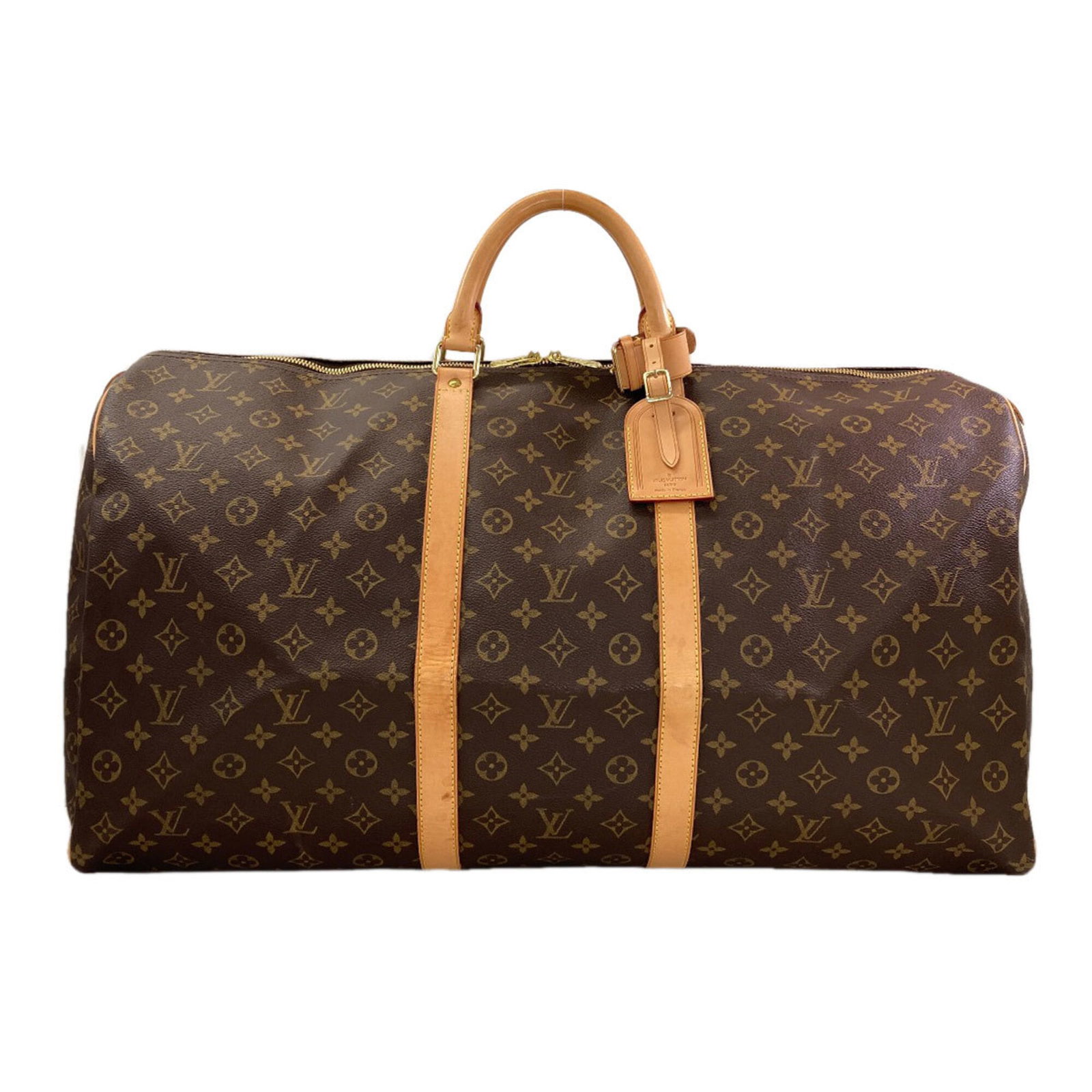 Vuitton Monogram Bag Louis Boston: Vuitton Monogram Bag Louis Boston Monogram pattern adorns this Louis Vuitton Boston bag, a classic design element of the iconic brand. The bag's sturdy dimensions and monogram material make it a