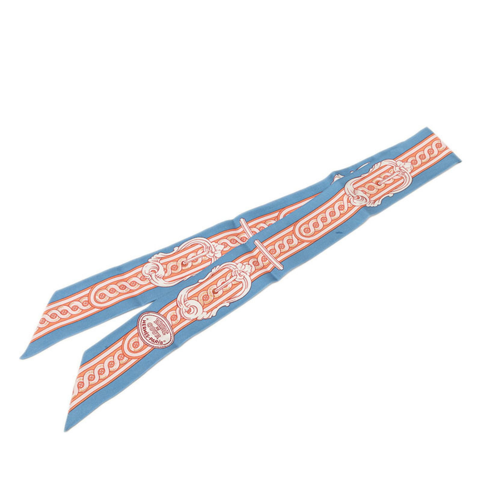 Silk Hermes Scarf: Silk Hermes Scarf Silk from the renowned French fashion house, this blue and pink Herm?s scarf boasts a sleek 86cm x 5cm design, perfectly balanced in its proportions. Made from luxurious silk, its