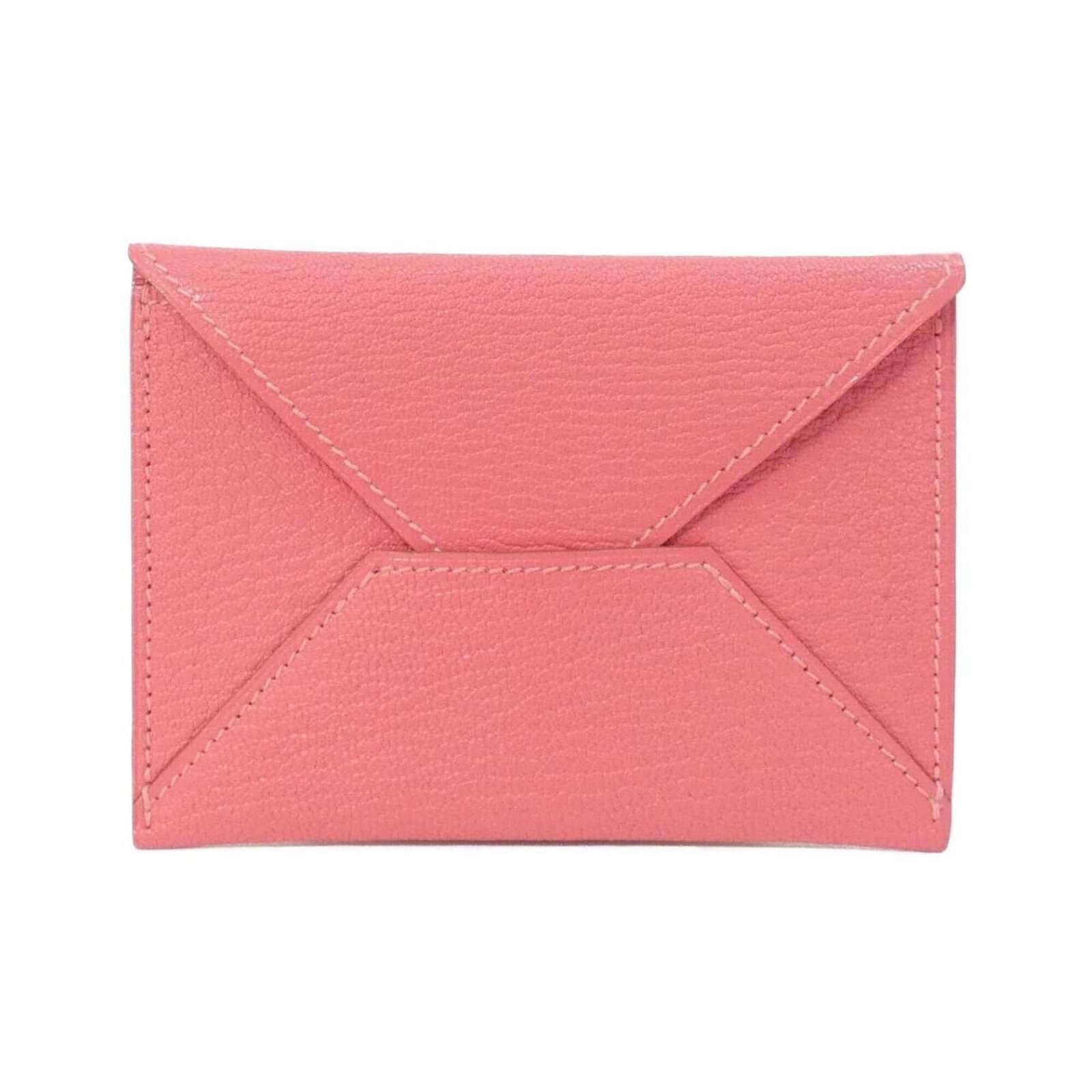 Chevre leather card case by Hermes: Chevre leather card case by Hermes Chevre leather card case by Hermes boasts a soft pink hue and sleek design, crafted from high-quality chevre leather. Measuring 8cm x 11.5cm x 5mm, this compact card