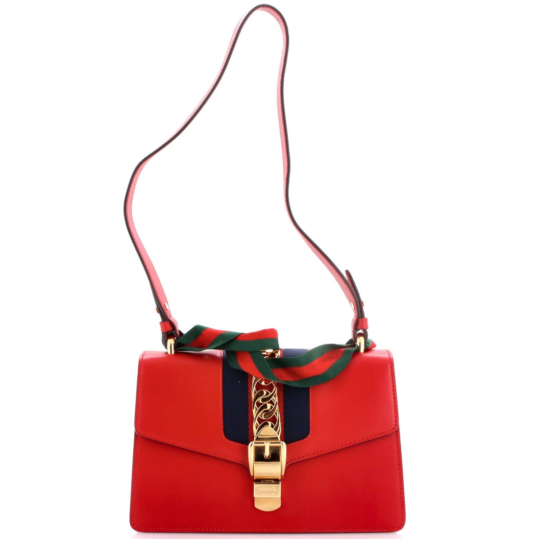 Small Leather Bag Sylvie Gucci: Small Leather Bag Sylvie Gucci Small Leather Bag Sylvie Gucci in striking red exterior, featuring a classic shoulder bag style with gold hardware and neutral interior. Minor scuffs and creases add a t