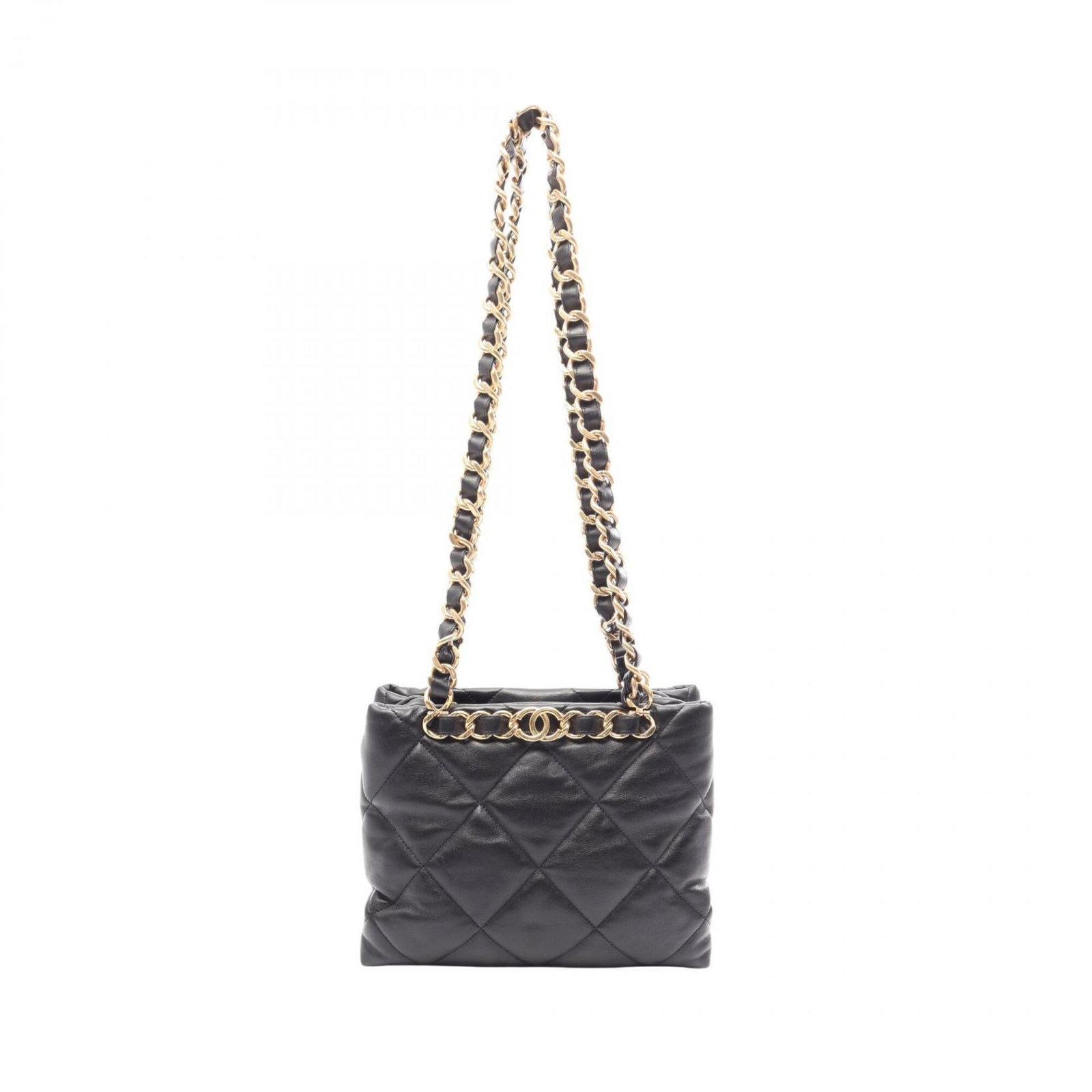 Chanel Handbag Leather Tote: Chanel Handbag Leather Tote Black leather tote bag from Chanel, featuring rabbit fur trim and gold hardware. Made from high-quality leather and rabbit fur, this classic design is a timeless addition