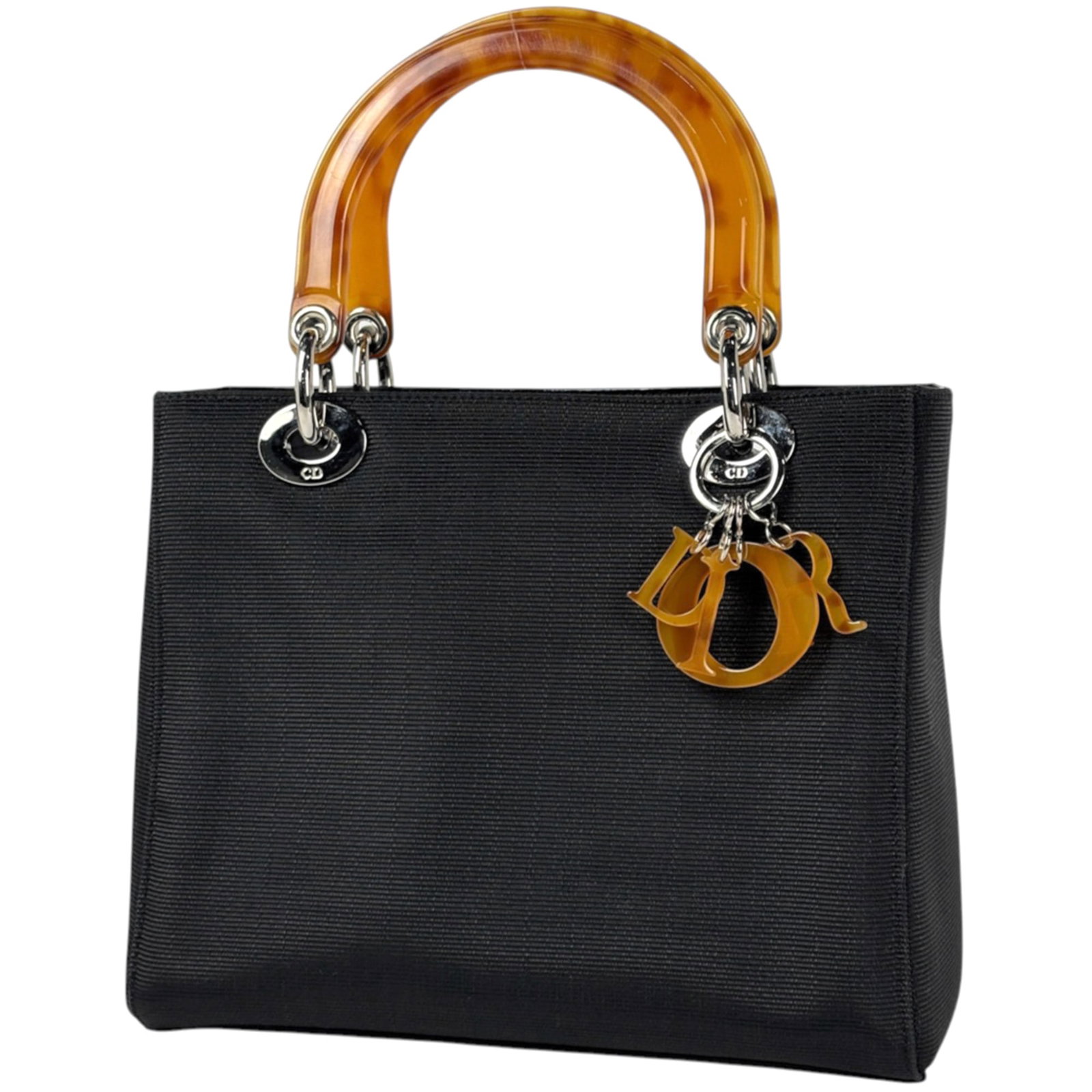 Canvas Leather Handbag Dior Christian: Canvas Leather Handbag Dior Christian Canvas Leather Handbag Dior Christian - A sleek and sophisticated Lady Dior handbag made from high-quality canvas and leather, featuring a striking black enamel