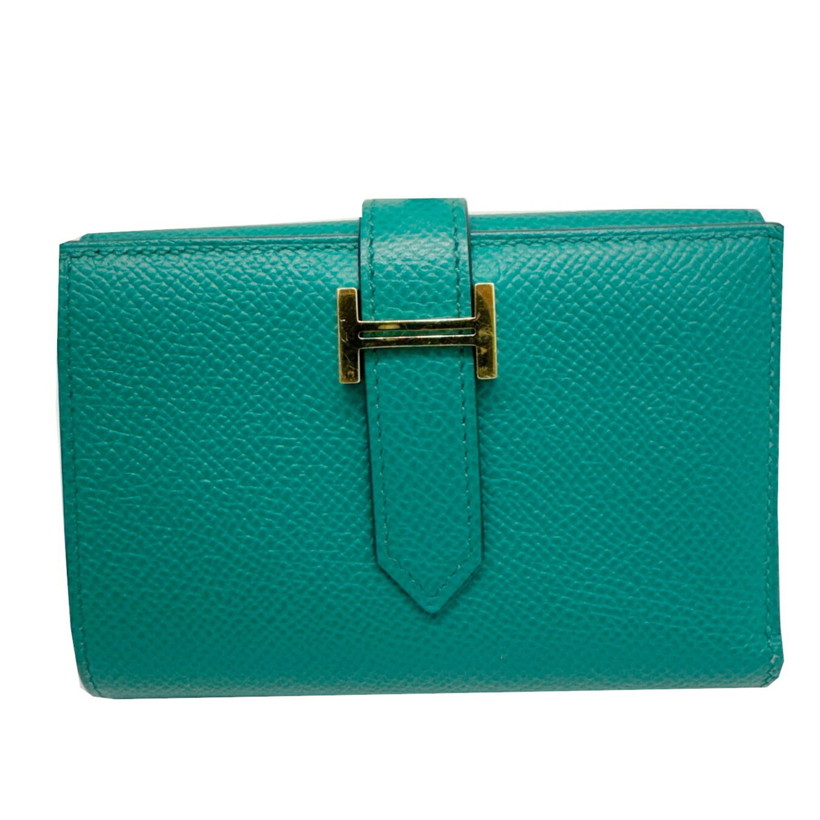 Epsom Leather Tri Fold Hermes: Epsom Leather Tri Fold Hermes Epsom leather provides a rich, luxurious feel to this tri-fold wallet from Hermes, with its distinctive green hue adding a touch of sophistication. The compact size and