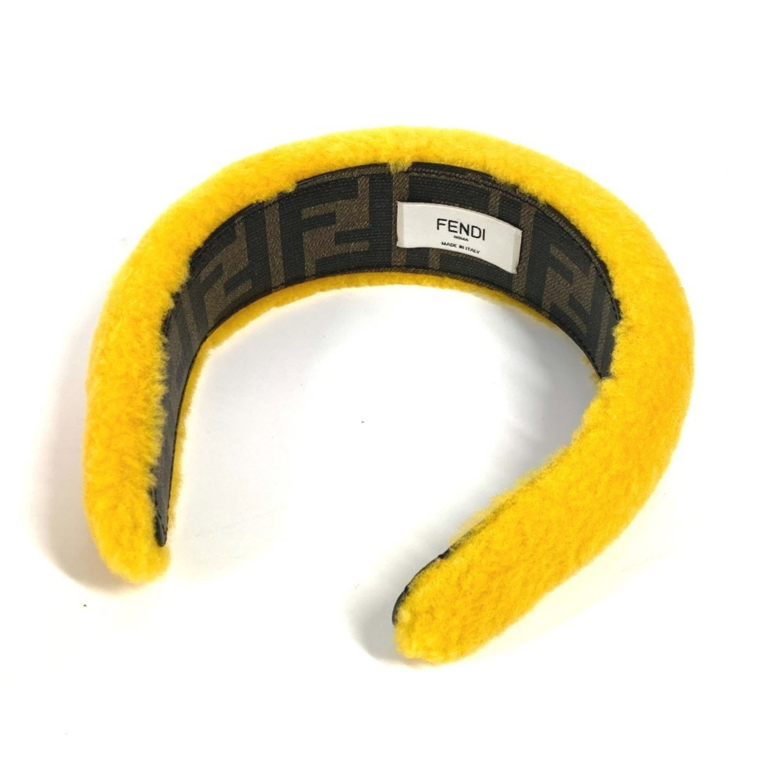 Alice Band Fur: Alice Band Fur Yellow fur Alice band, made by Fendi, measures 4cm x 1.57'' in size. This small, yellow fur band is a distinctive accessory. Item Specifics: Brand: Fendi Type: Alice band Gender: Women 
