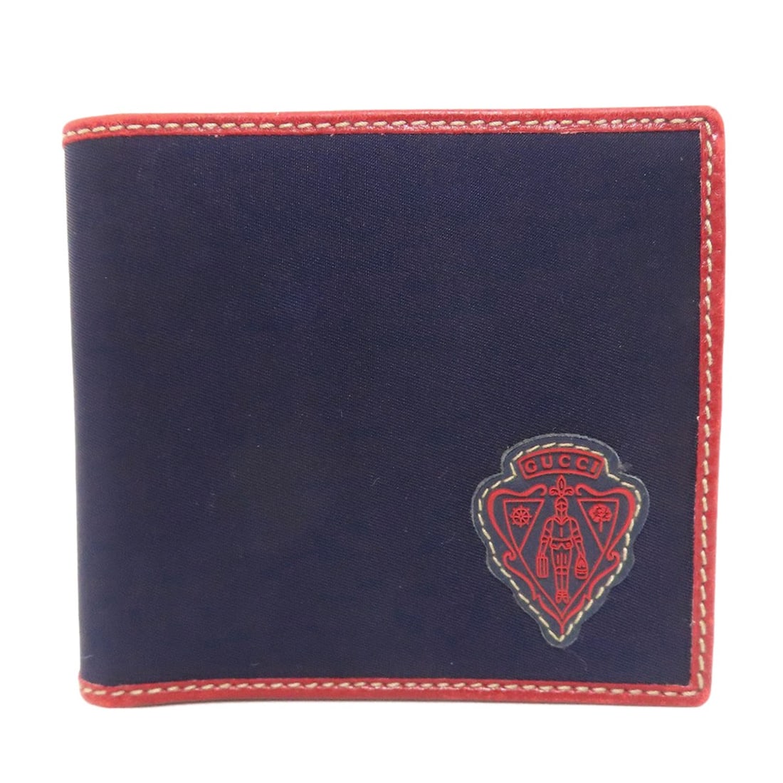 Gucci Wallet Logo Bifold With Coin Nylon 190415: Gucci Wallet Logo Bifold With Coin Nylon 190415 Navy nylon bifold wallet with coin pocket, a classic design from Gucci. The wallet's exterior features a bold logo, while the interior provides a sleek
