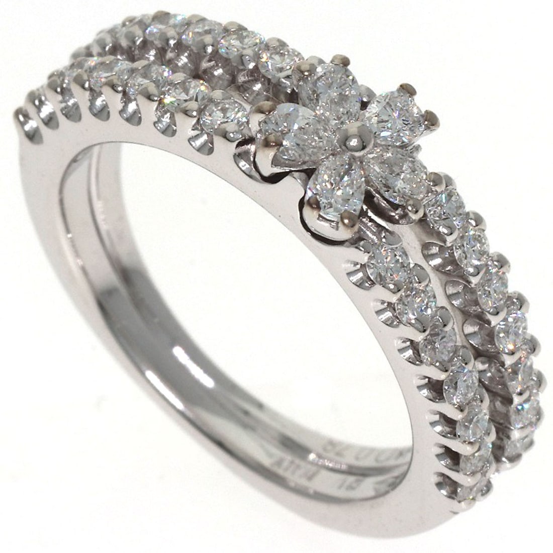 White Gold K18 Diamond Ring Motif Flower: White Gold K18 Diamond Ring Motif Flower K18 White Gold K18 Diamond Ring Motif Flower features a delicate, intricate design with a total carat weight of 0.78ct in a D color diamond. The ring is