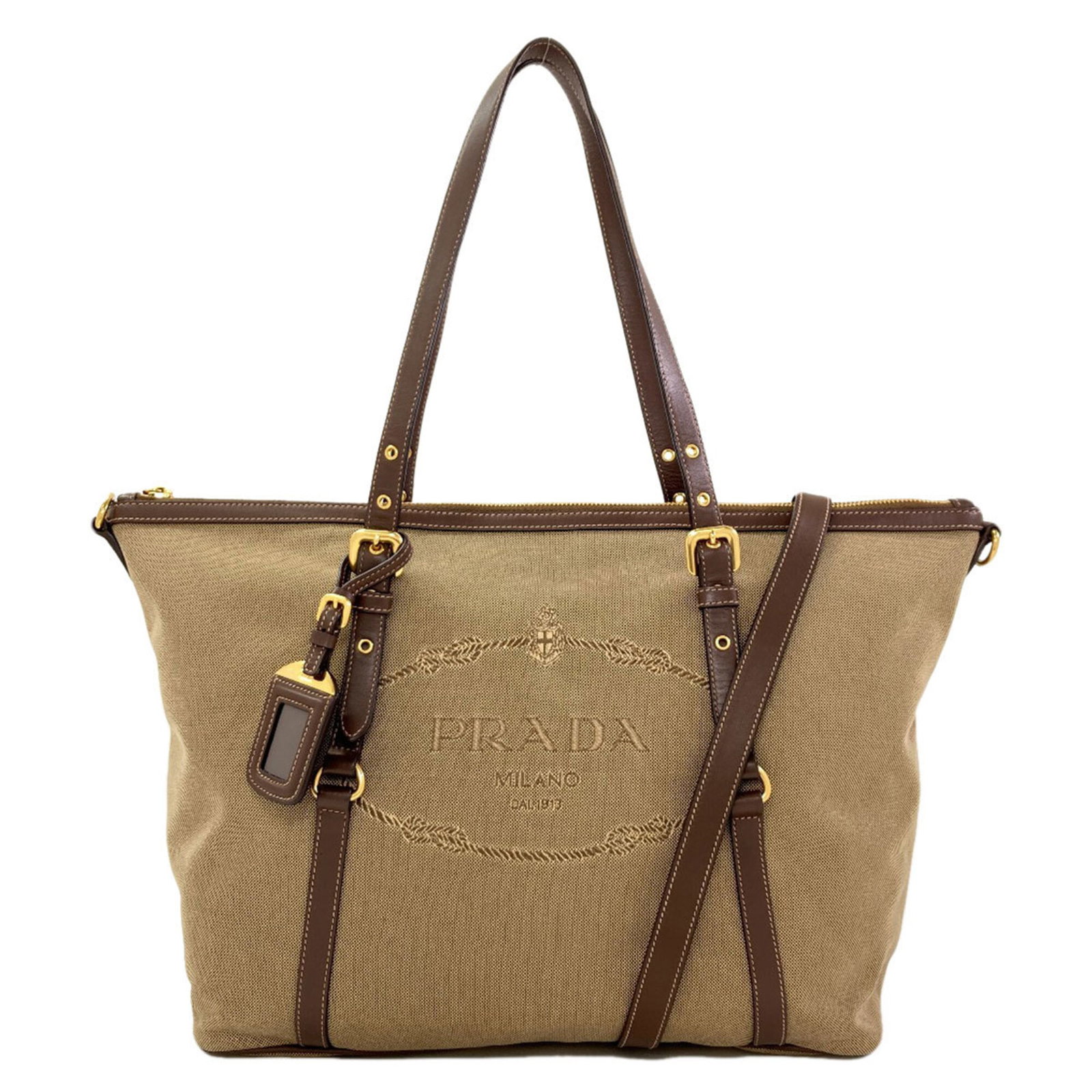 Canvas Leather Prada Bag Tote: Canvas Leather Prada Bag Tote Canvas Leather Prada Bag Tote - A stylish and versatile tote bag made from high-quality canvas and leather, featuring a classic Prada design. With a sturdy zipper